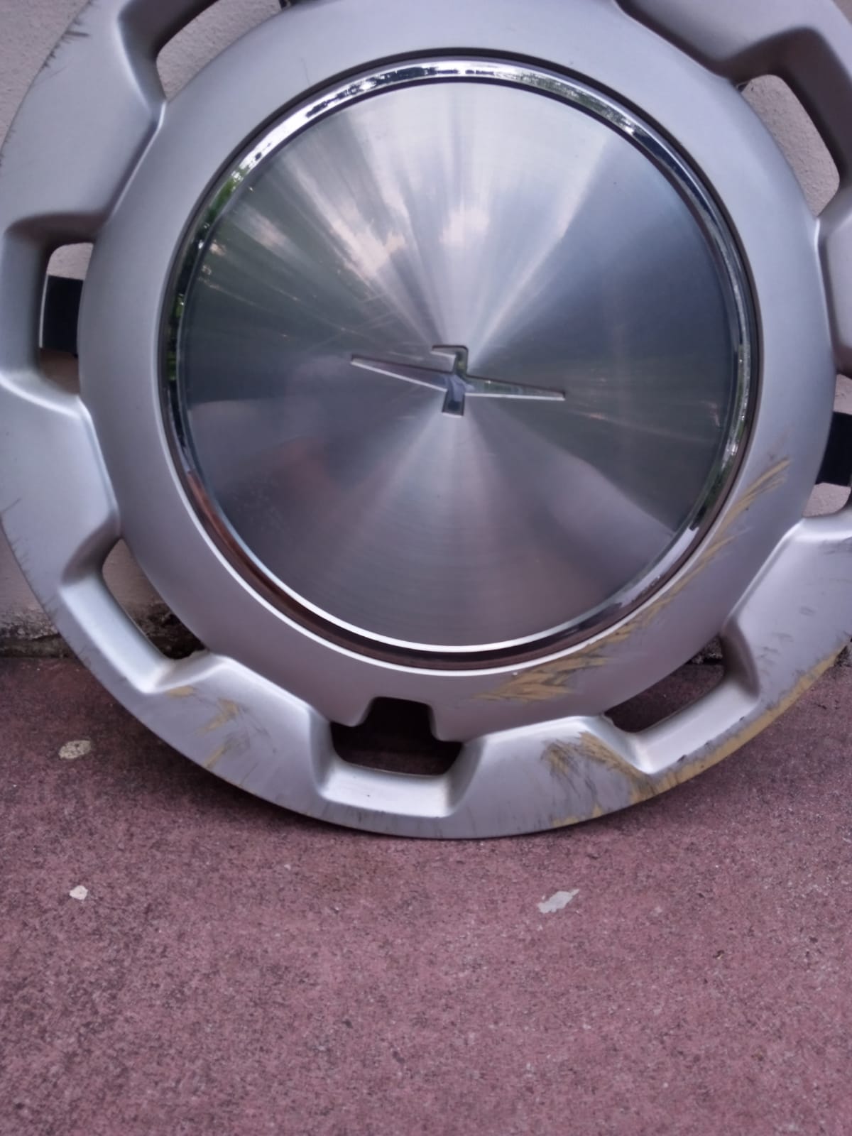 Can you help me identify what car this wheel trim belongs to? r/Autos