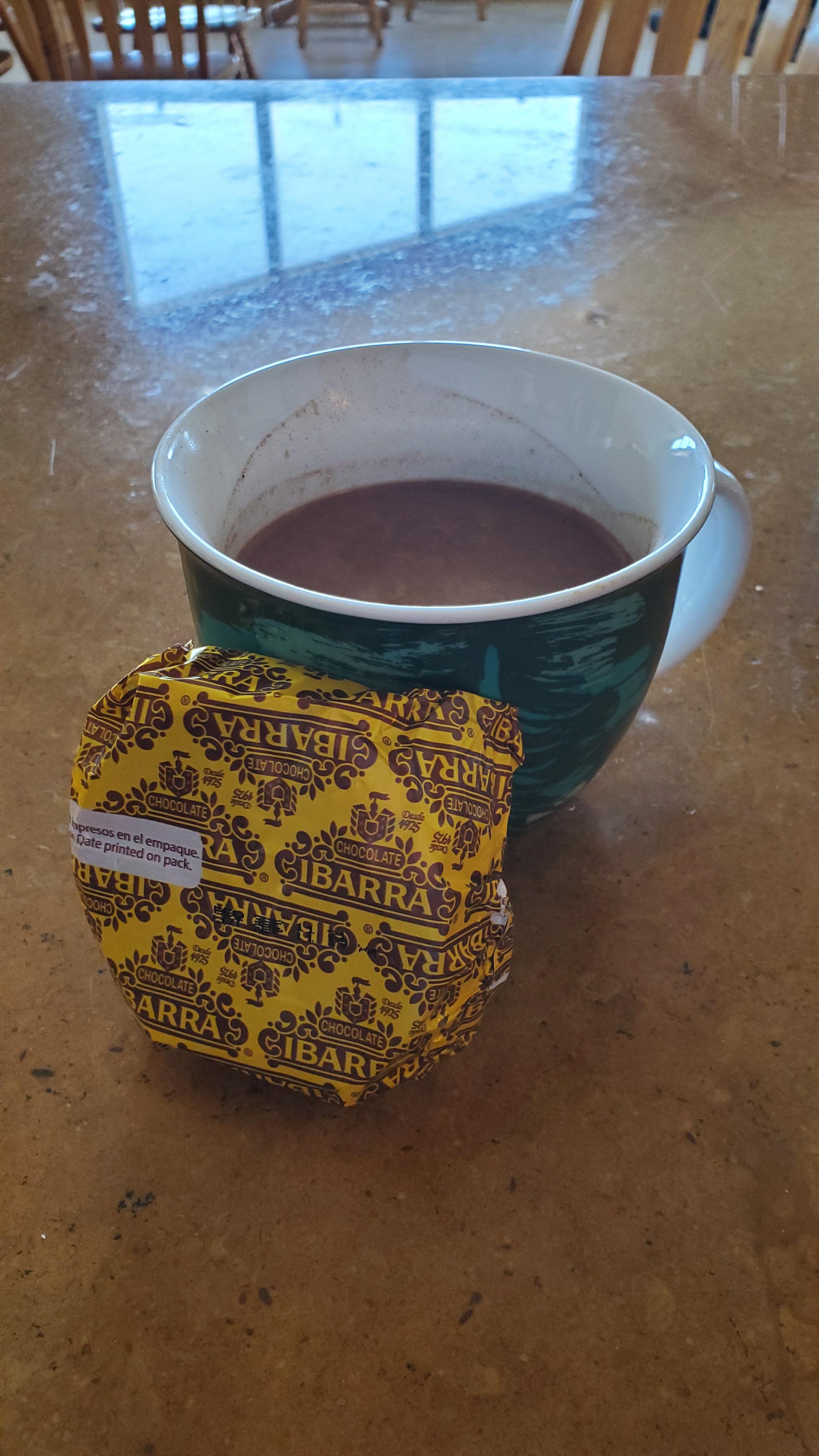 My green Starbucks mug featuring Ibarra hot chocolate. Adding some