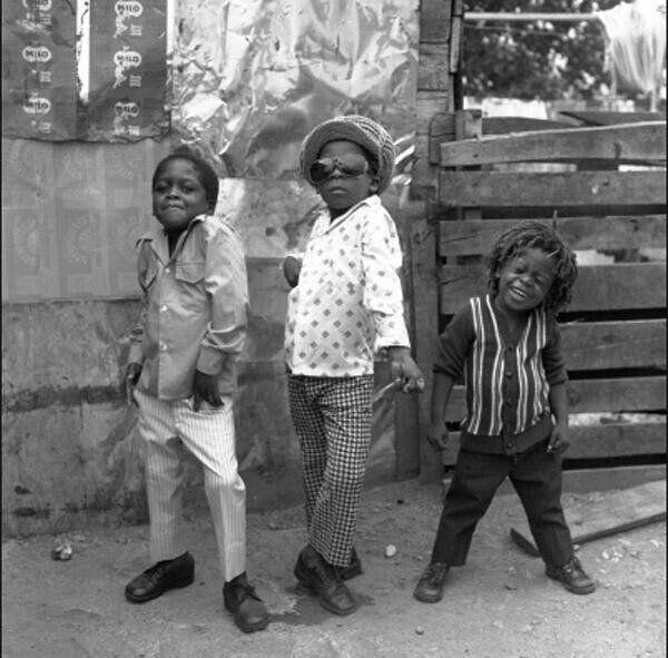 Striking a pose Kingston, Jamaica, 1974 r/imagesofthe1970s