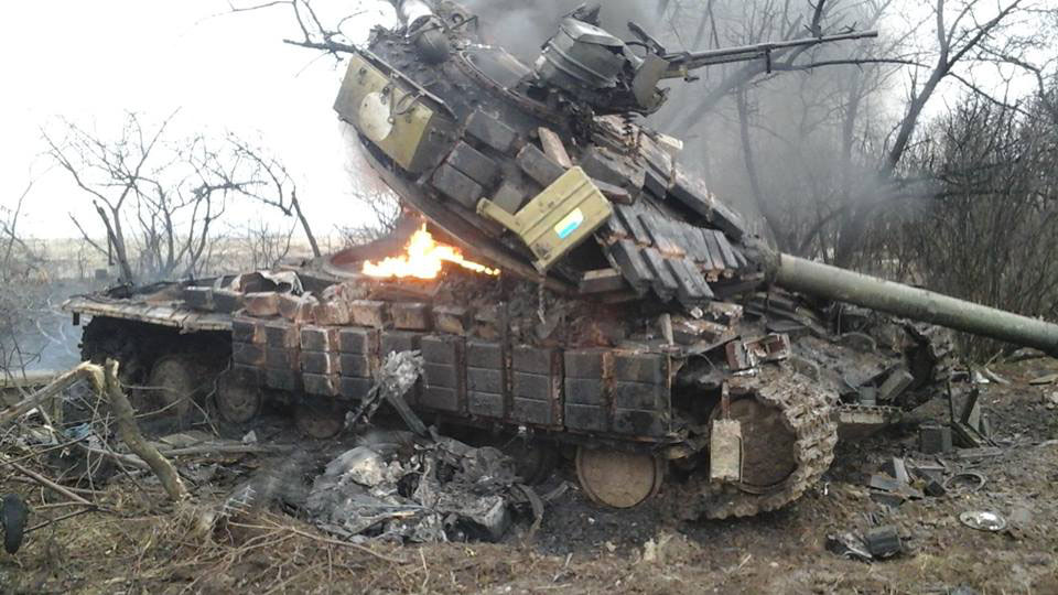 Ukrainian T64 of the 17th Guards Tank Brigade knocked out by an ATGM