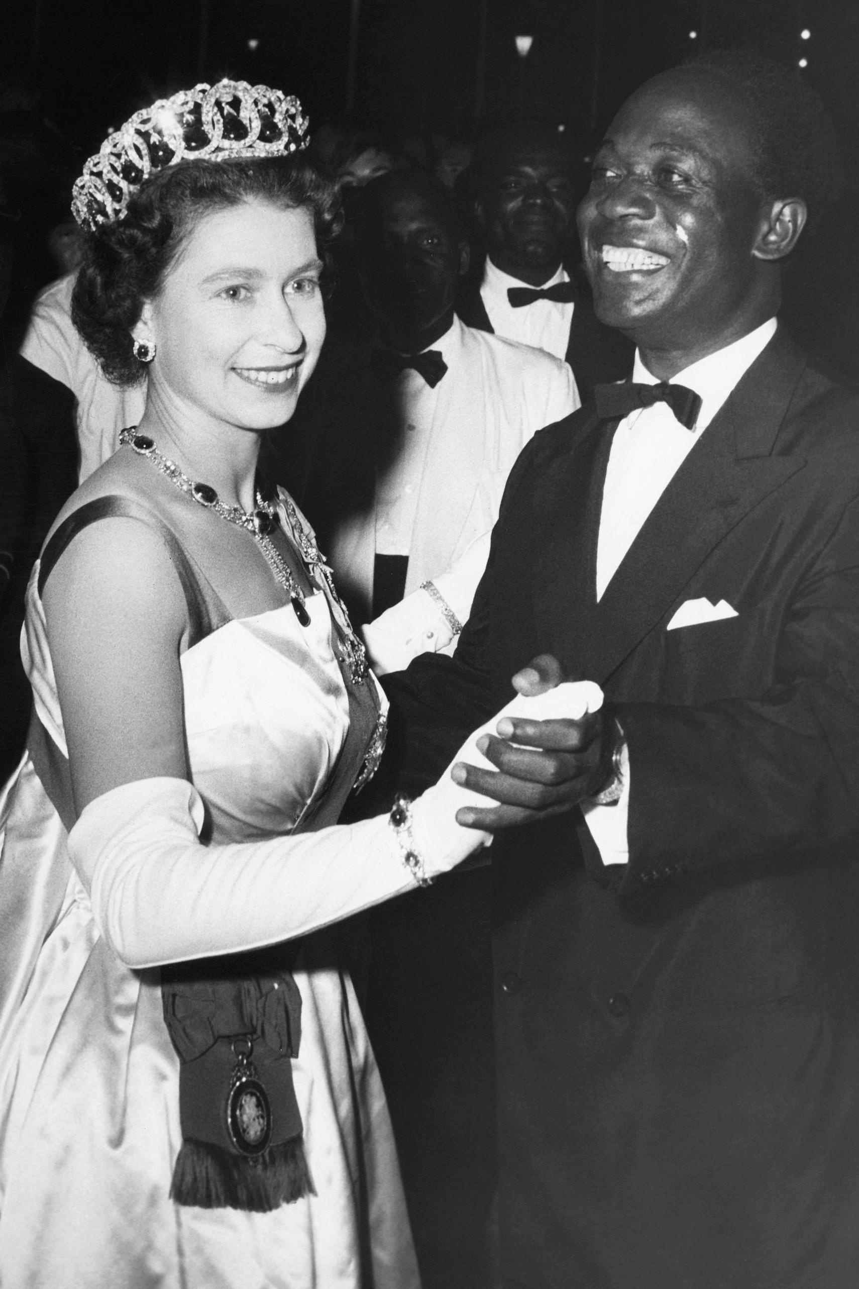 Queen Elizabeth II dances with Ghanaian president Kwame Nkrumah at a
