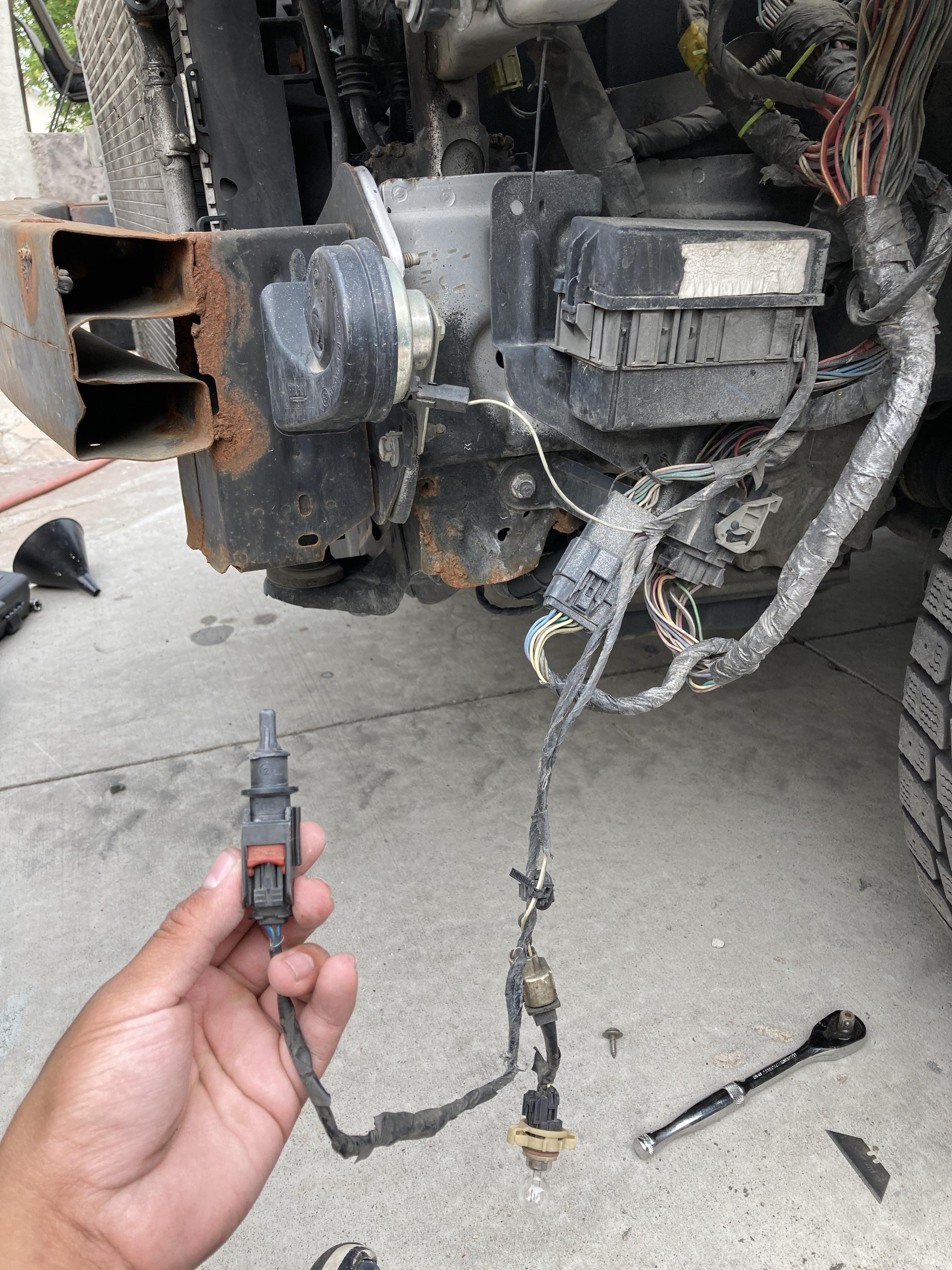 Does anyone know where this temperature sensor goes in a 2010 jeep