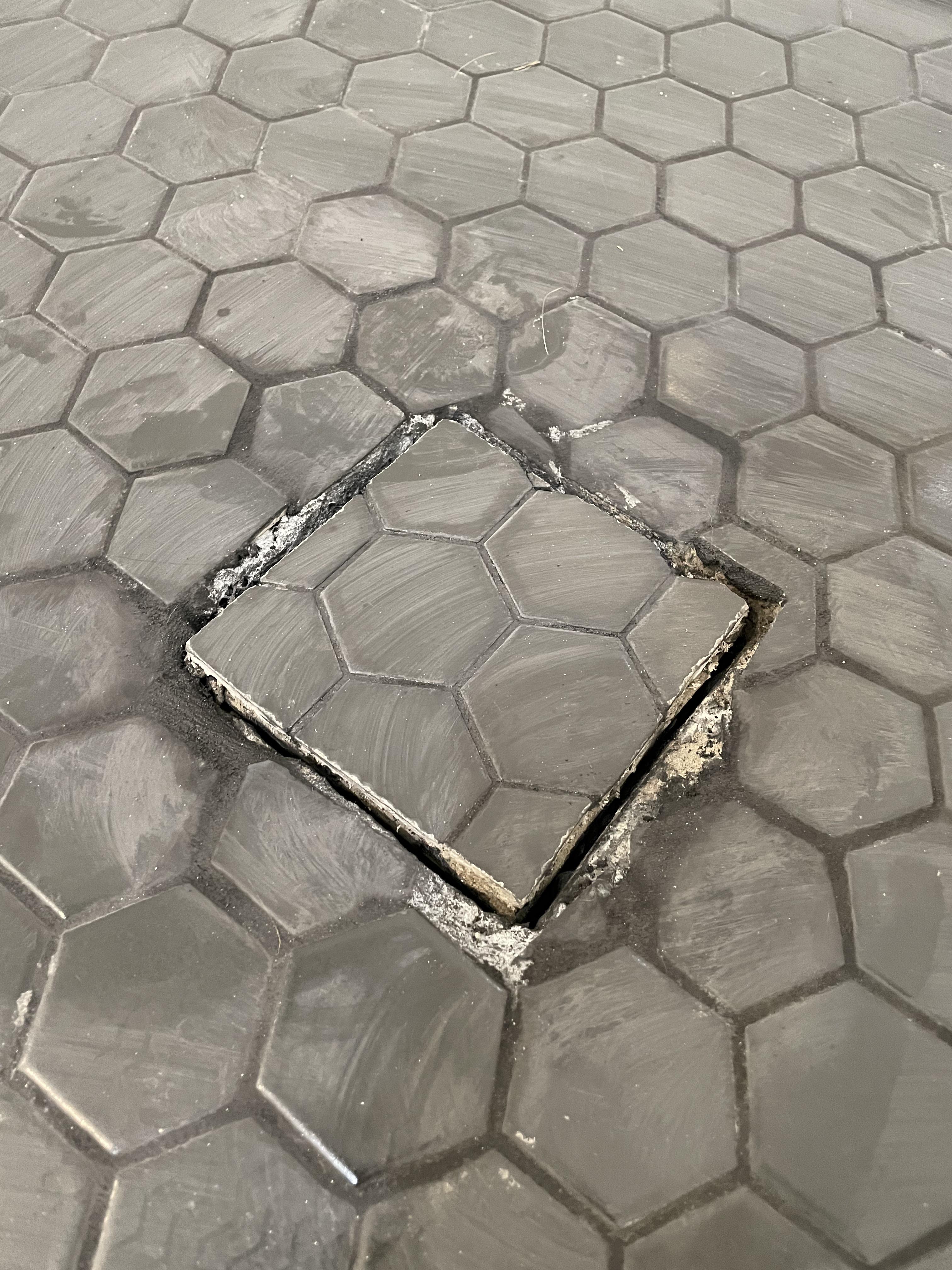 Is this a common process for shower drain? My bathroom contractor took