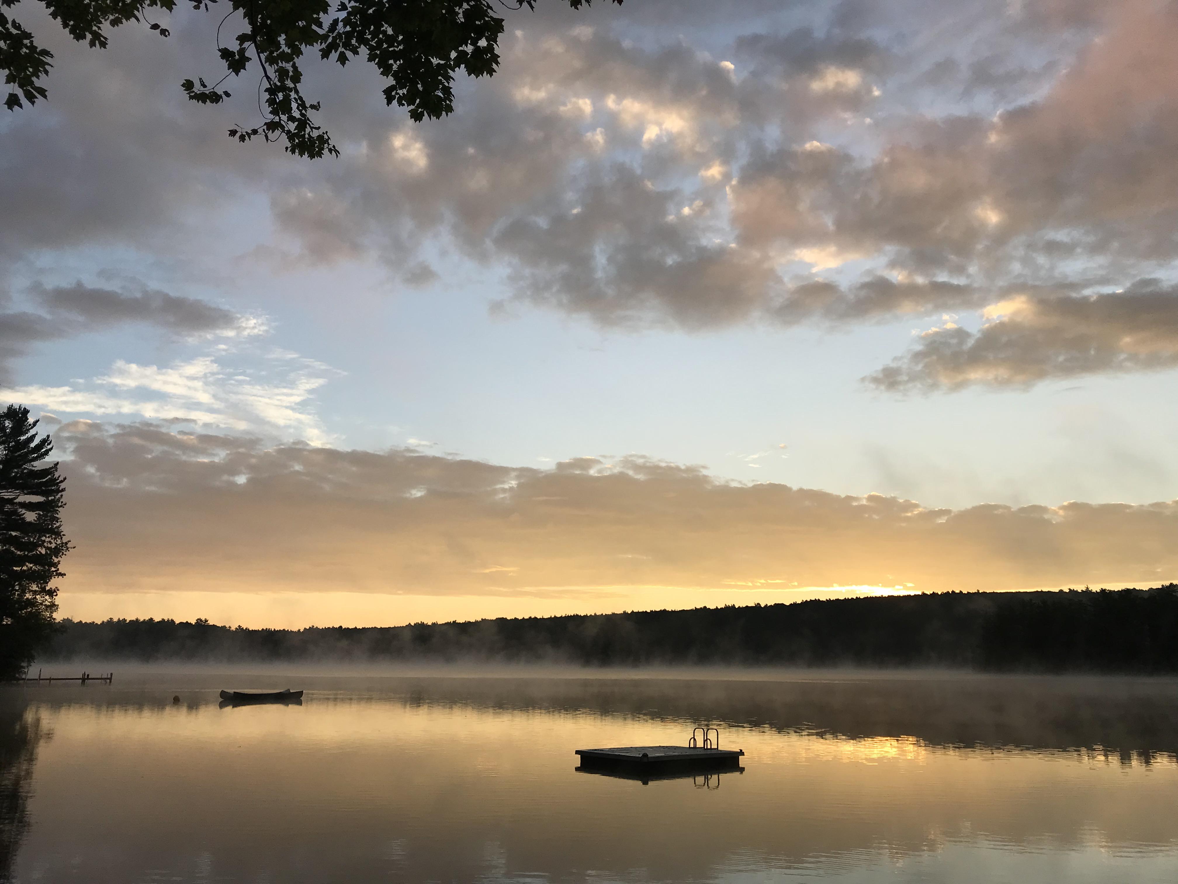 Sunrise on Raymond Pond, Maine. r/camping