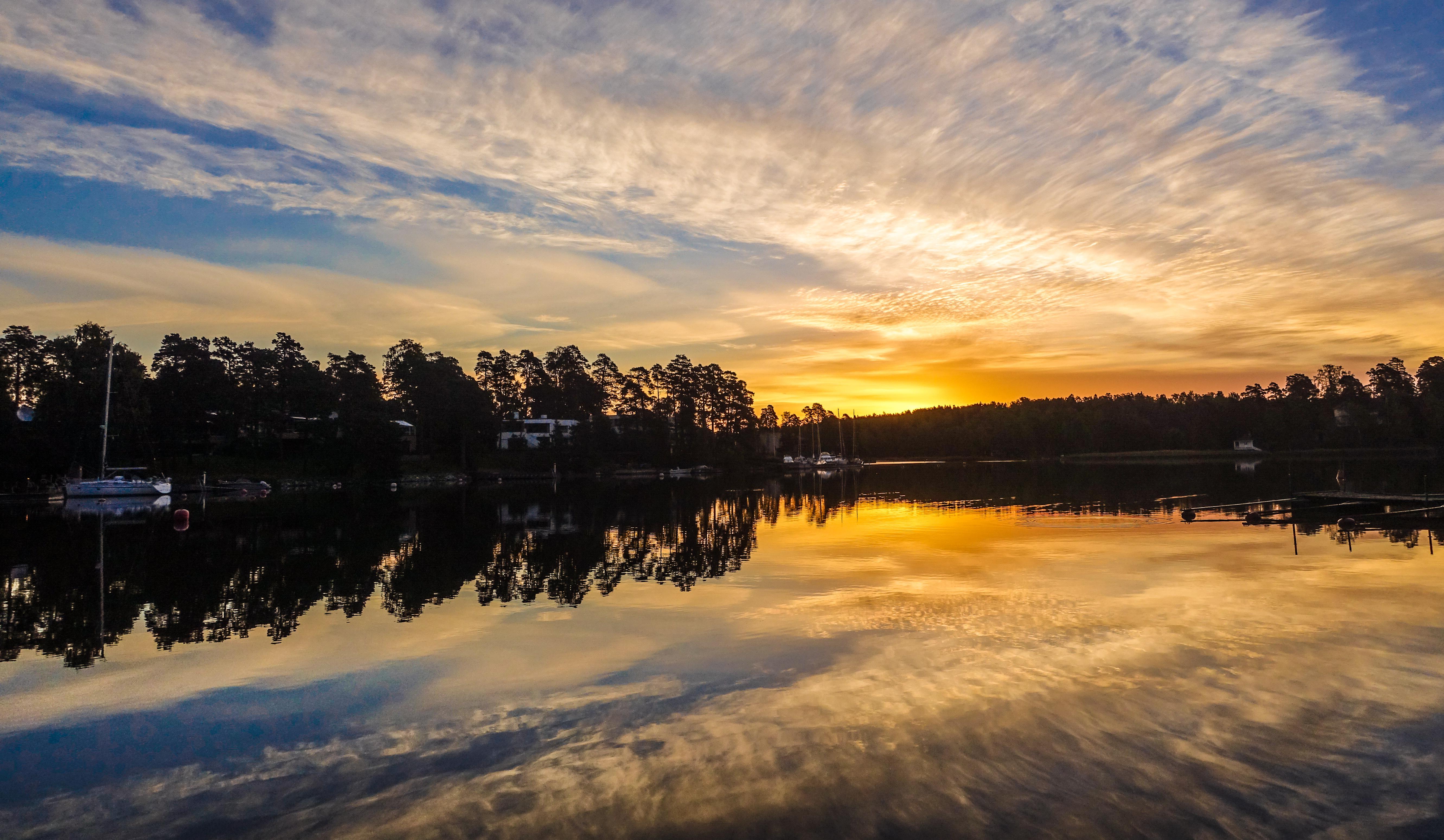 Sunrise in Finland, "the land of a thousand lakes". r/backpacking