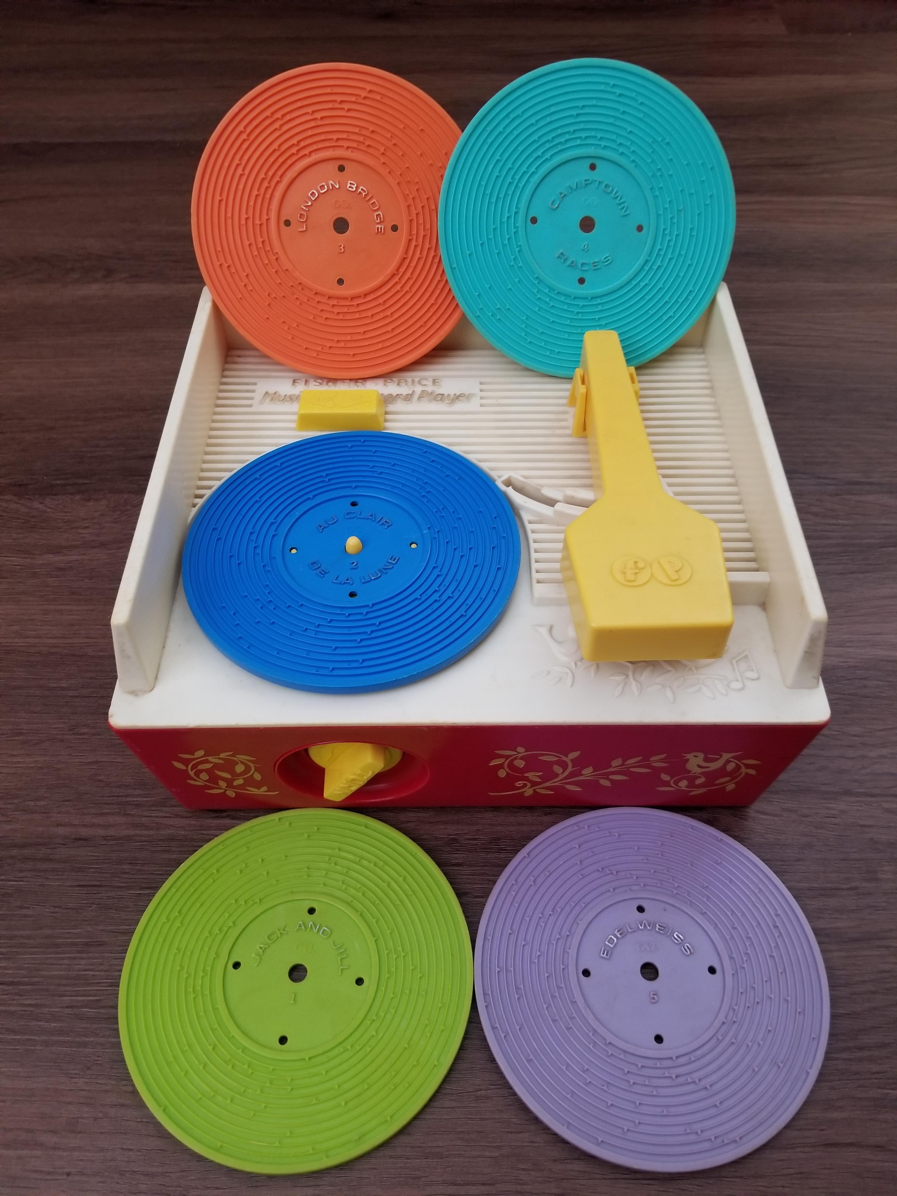 My 8 month old son's Fisher Price turntable. Anyone had one of these