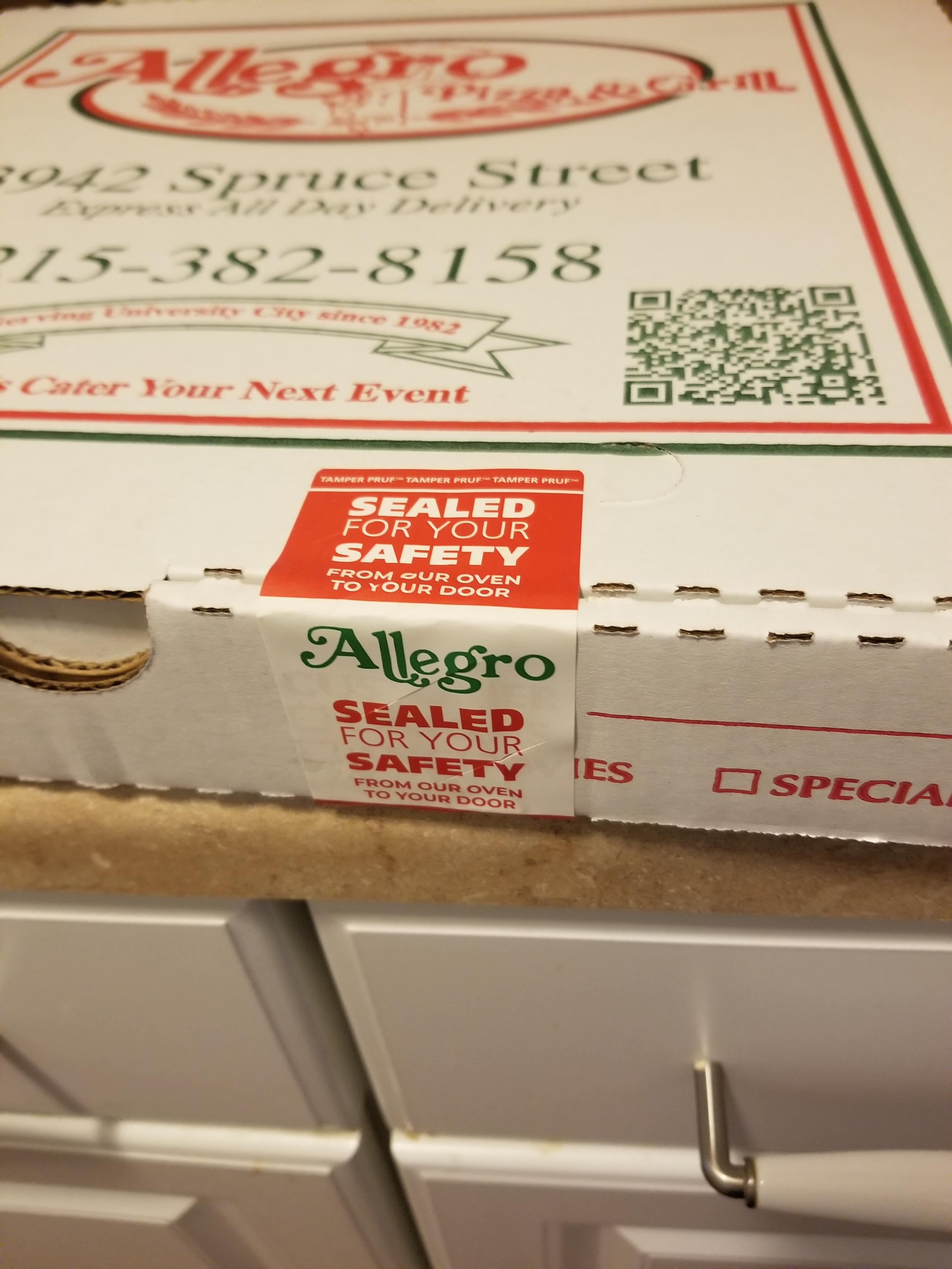 My pizza came delivered with a tamperproof seal r/mildlyinteresting