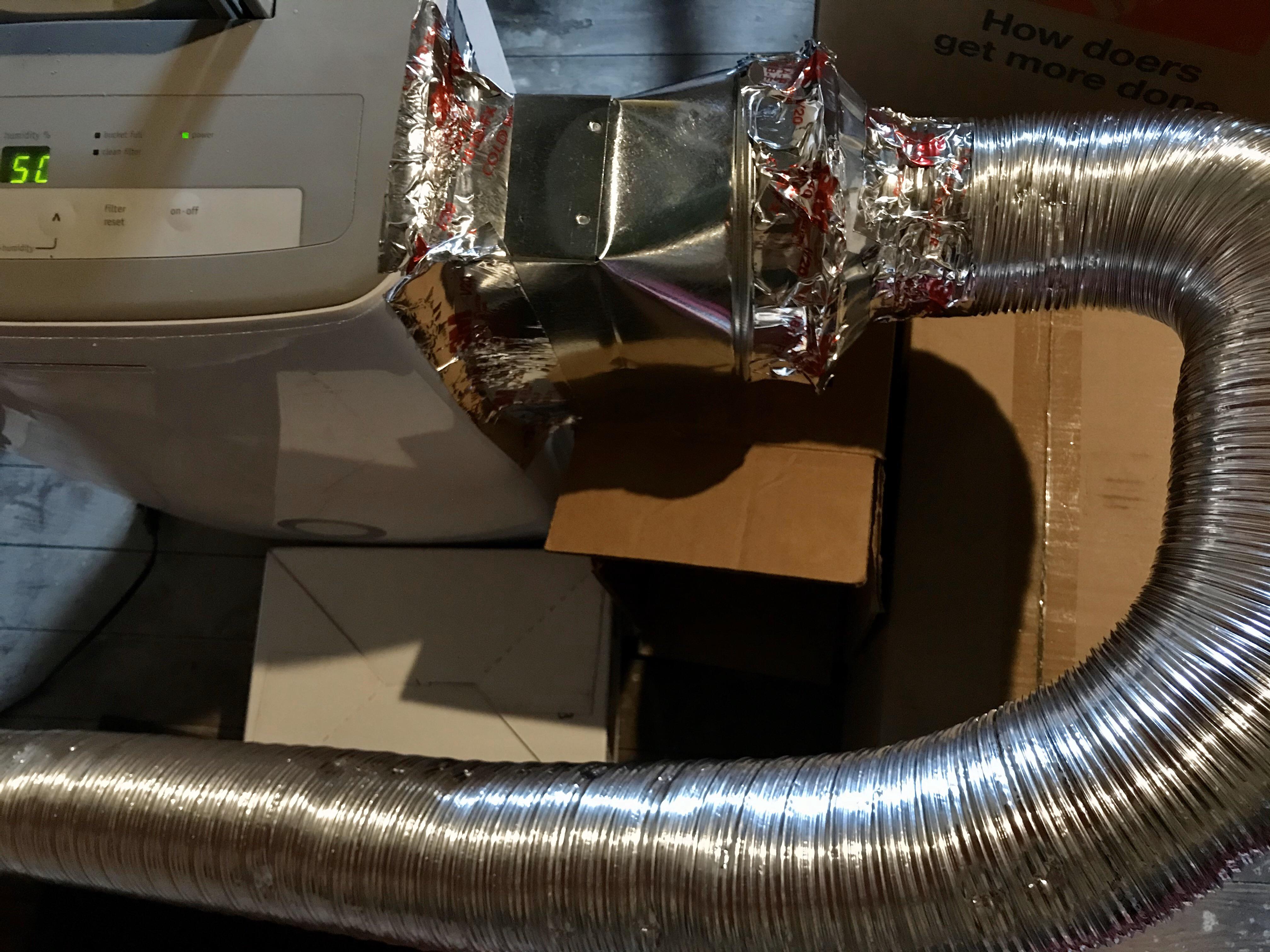 Is this DIY dehumidifier exhaust safe? Previous homeowner had this set