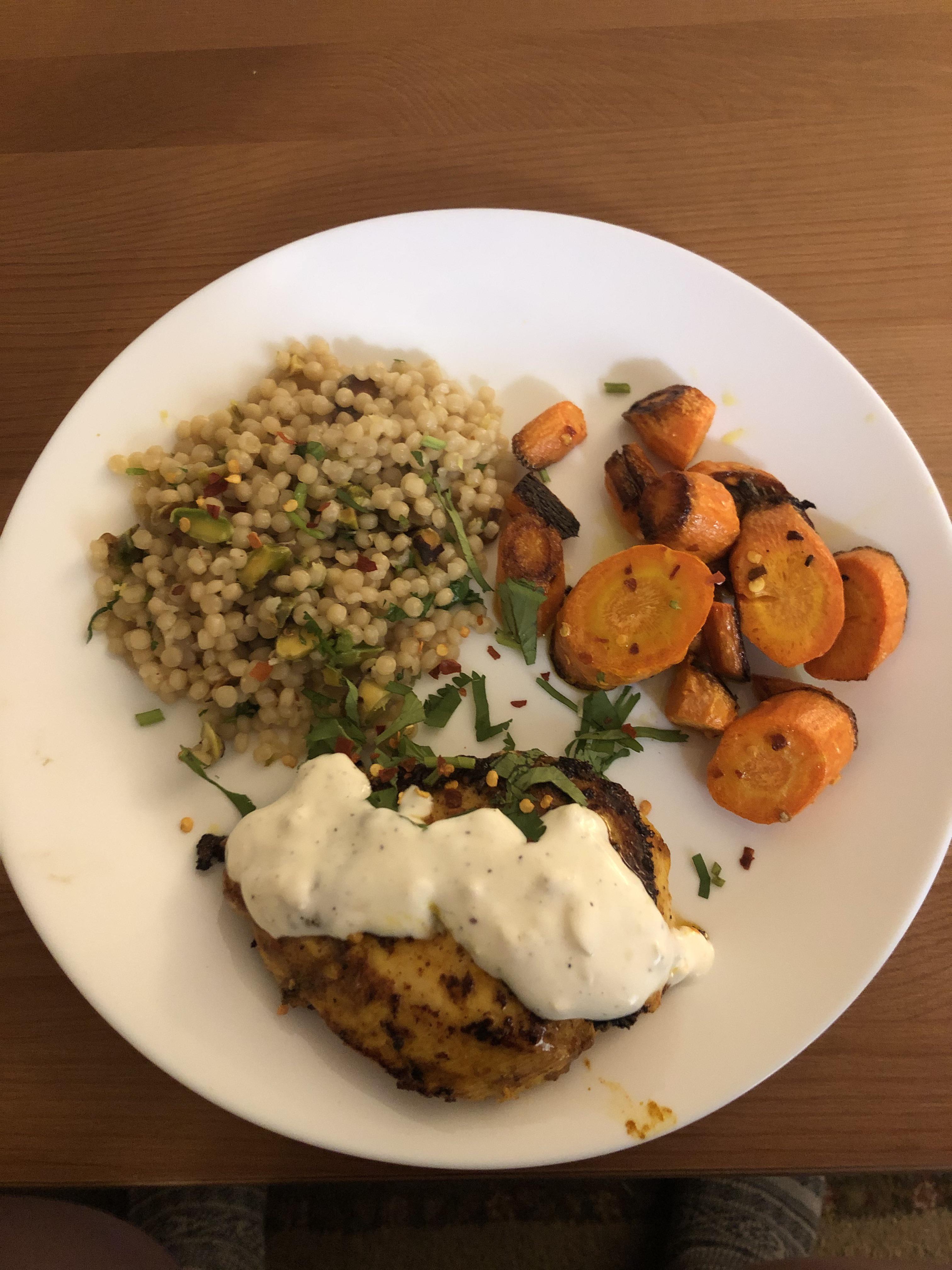 Yogurt marinated chicken with garlic sauce. Plus pistachio couscous and