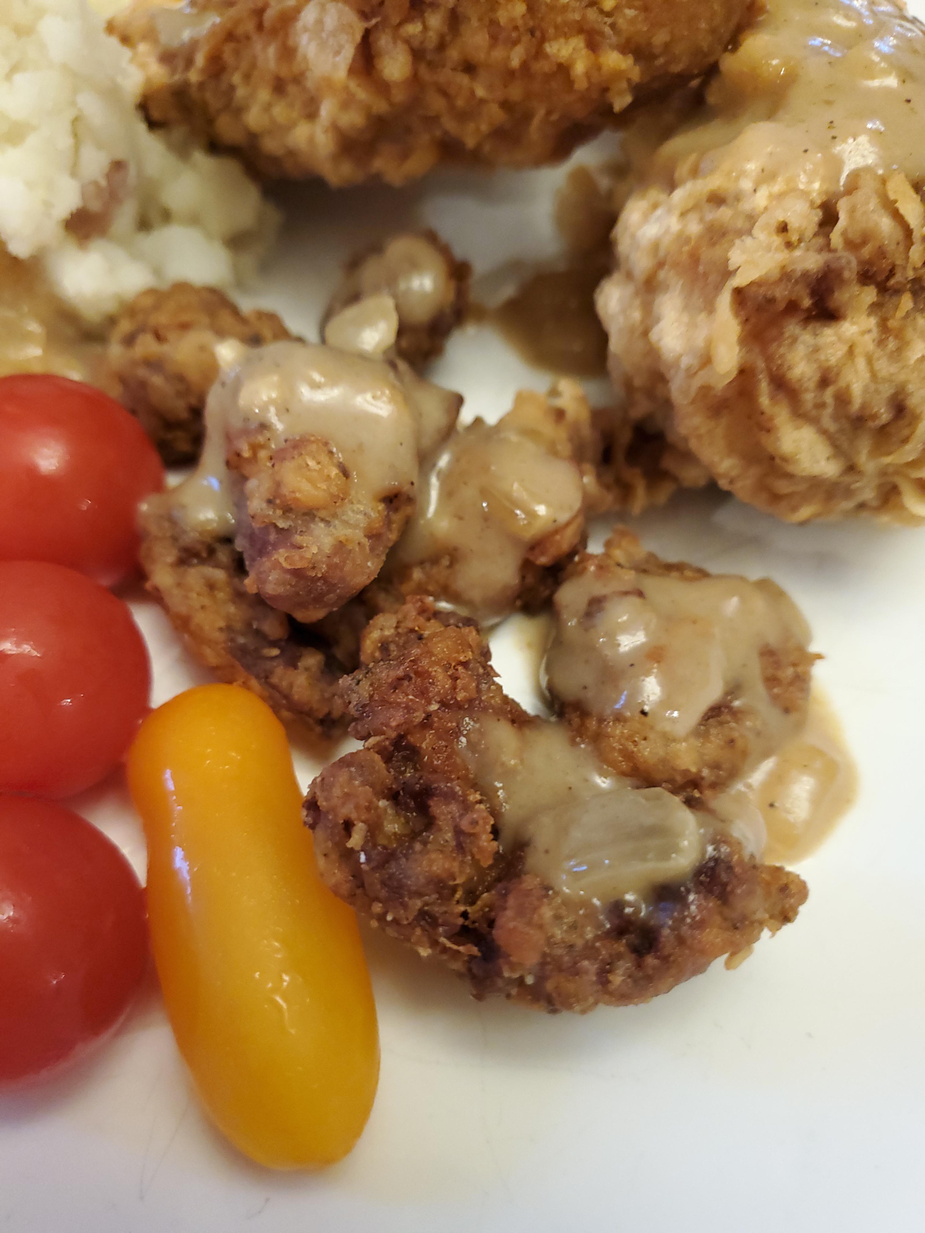 Southern fried chicken hearts in a bacon, thyme cream gravy r/meat