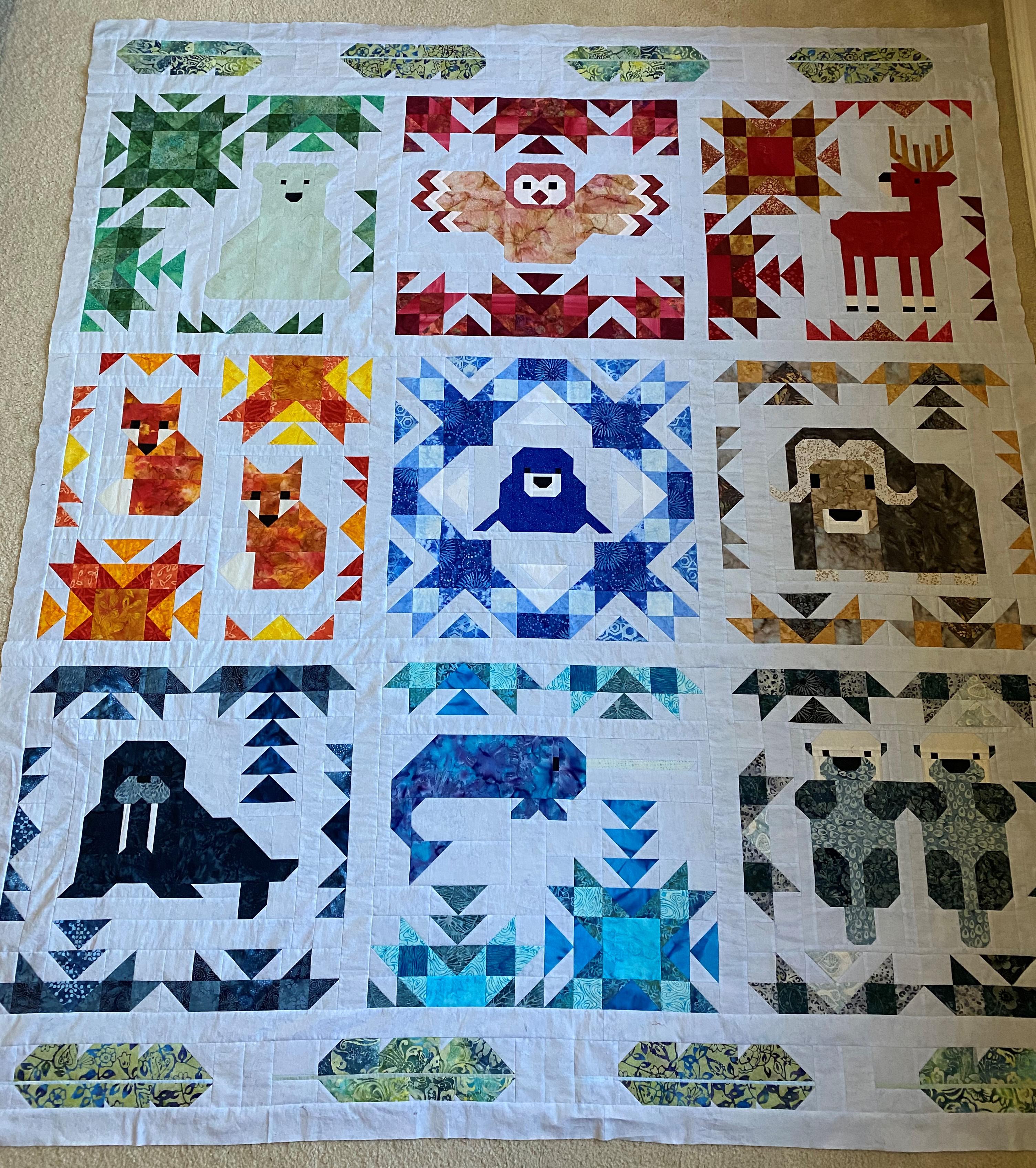 Completed quilt top. North Stars and Arctic Feathers. Patterns by