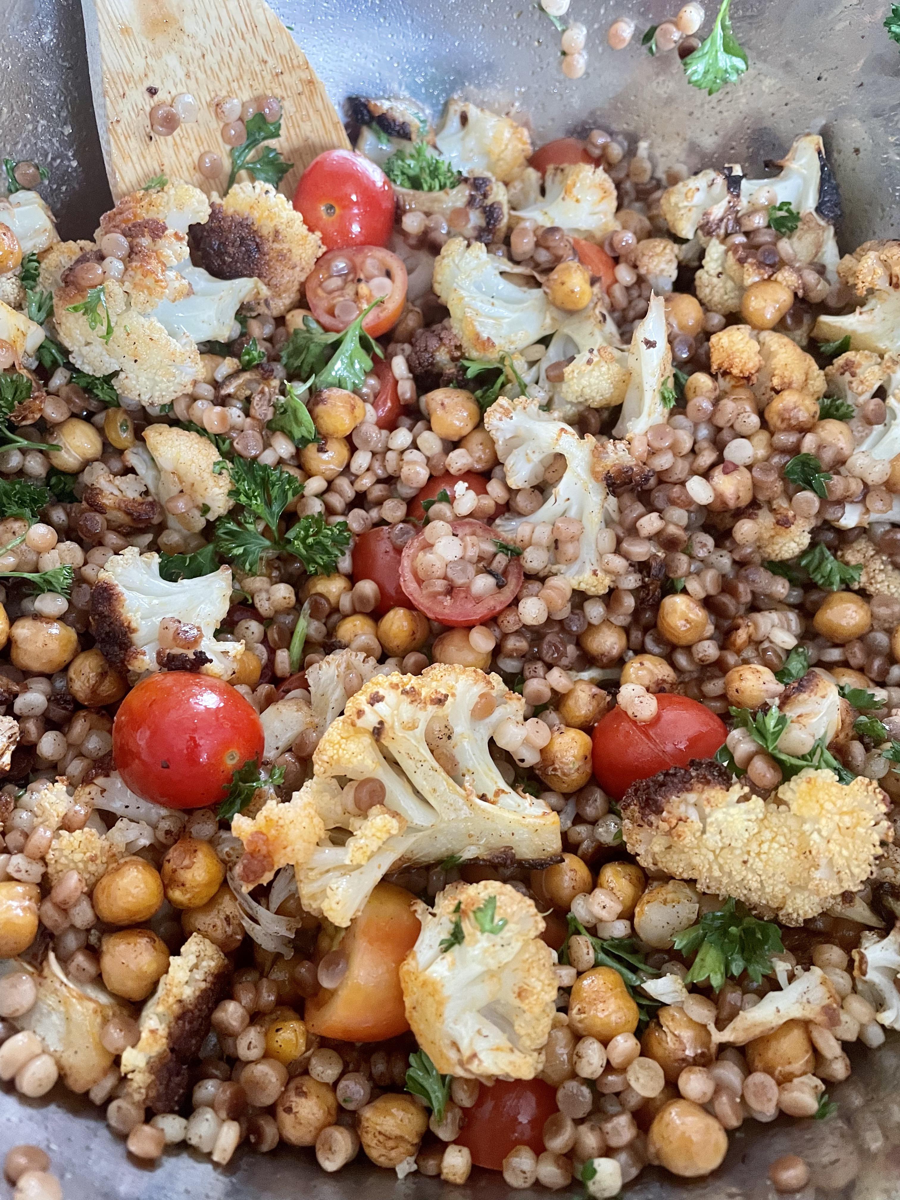 Roasted cauliflower and cherry tomatoes with Israeli couscous and