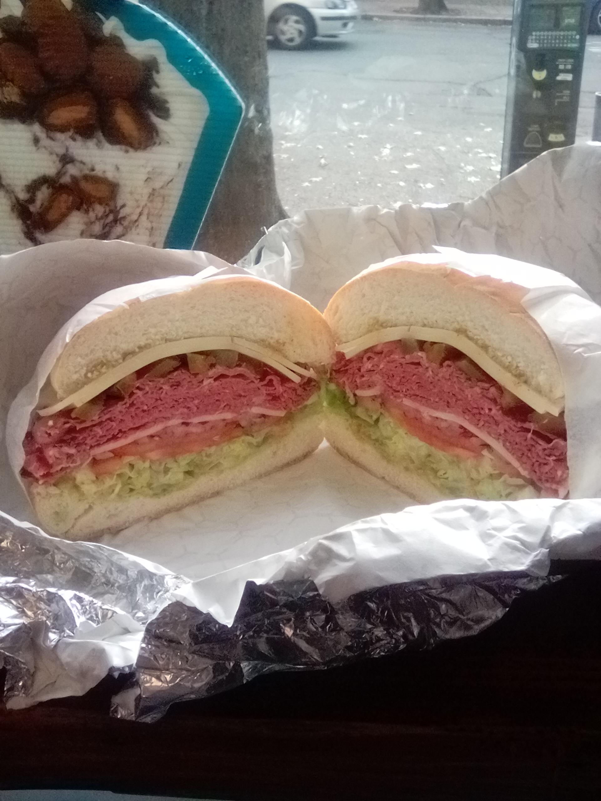 Boar's Head pastrami, swiss, and cherry peppers, on a roll, from the