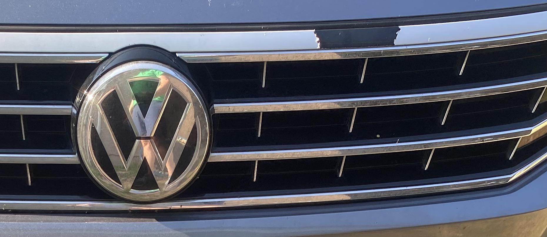 Any idea how to repair this? 2017 Passat chrome grille peeling from the