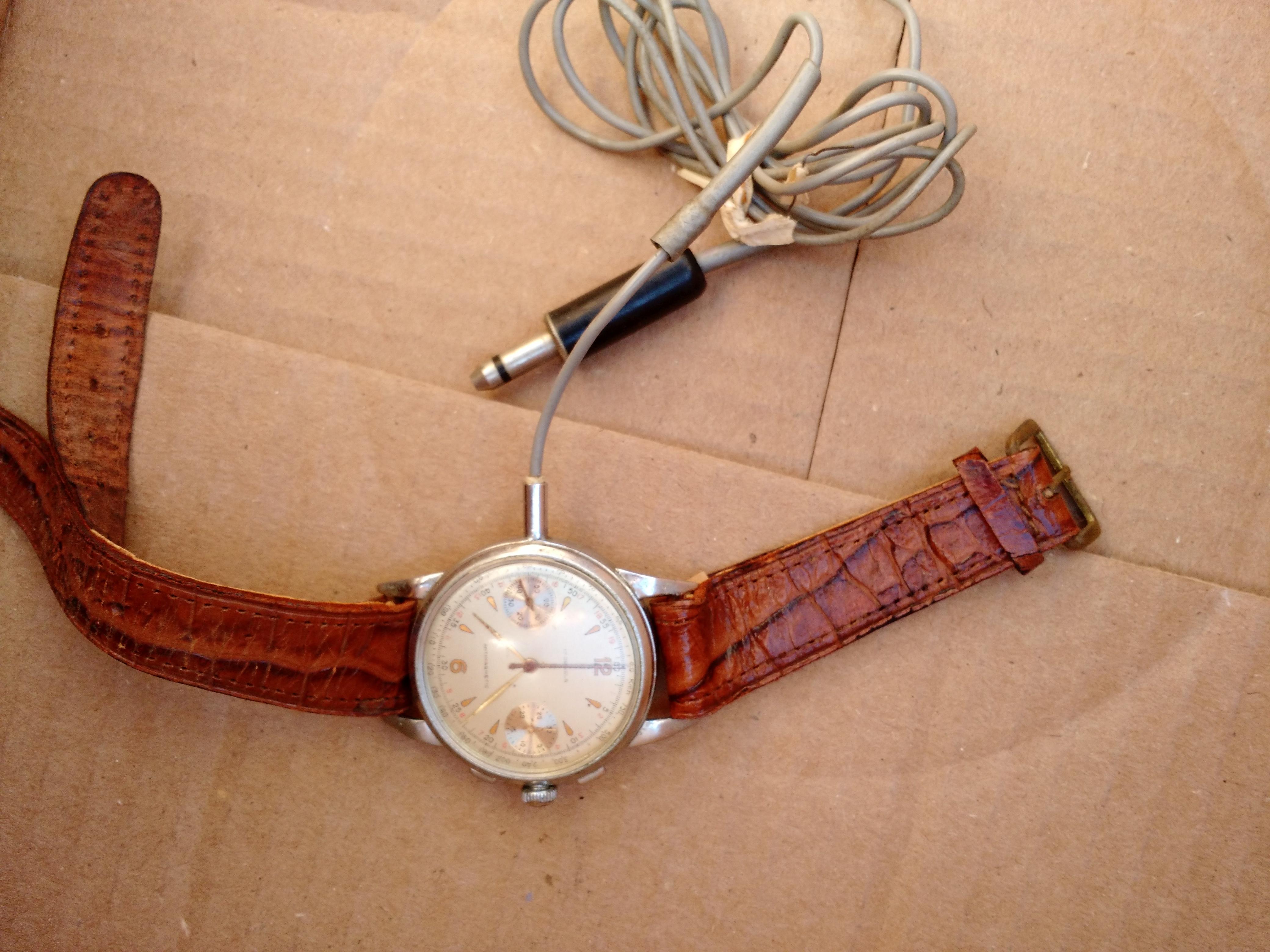 [Identify] Watch with permanently attached wire; anyone know what it is