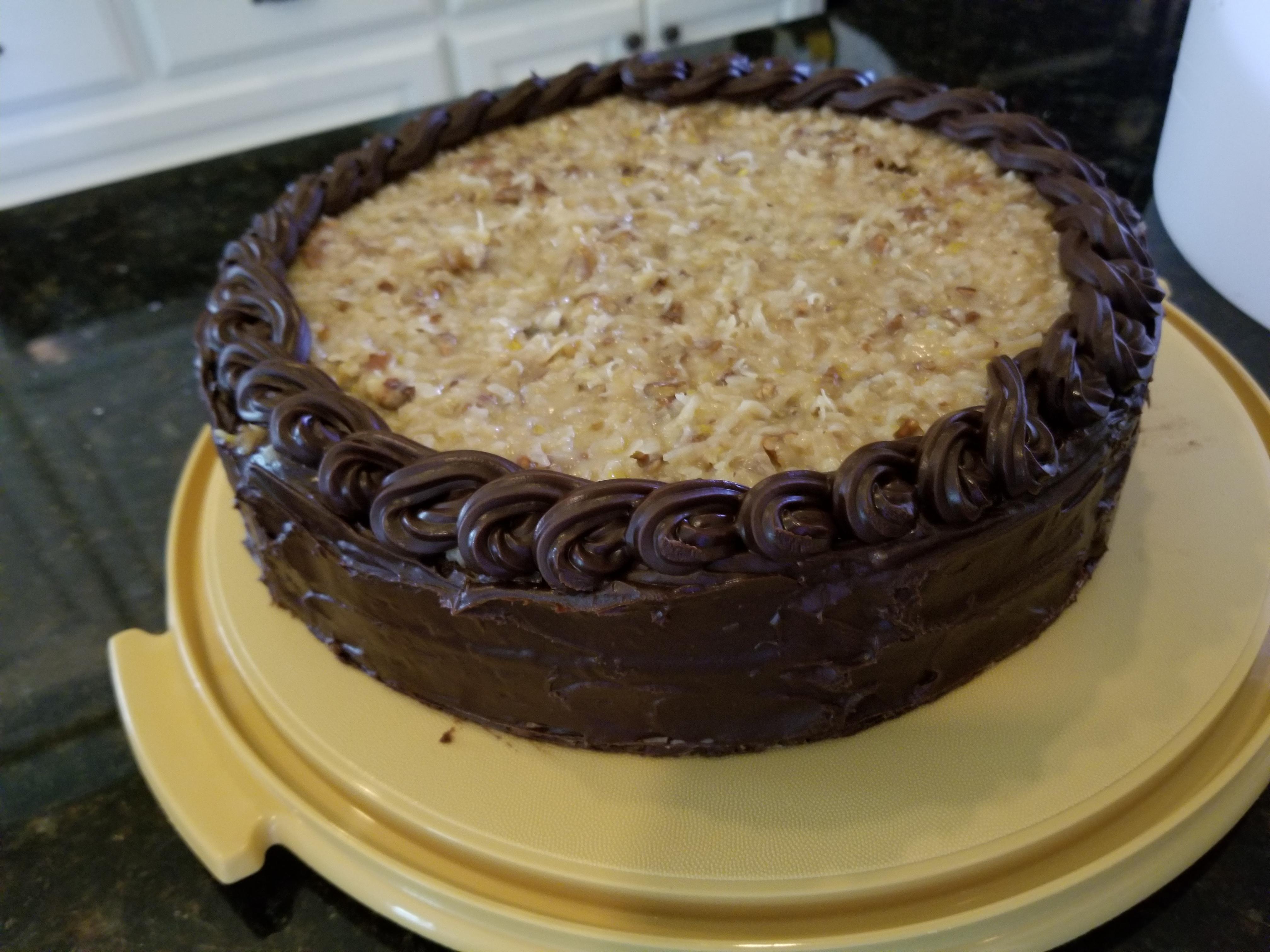 German chocolate cake with ganache border. r/Baking