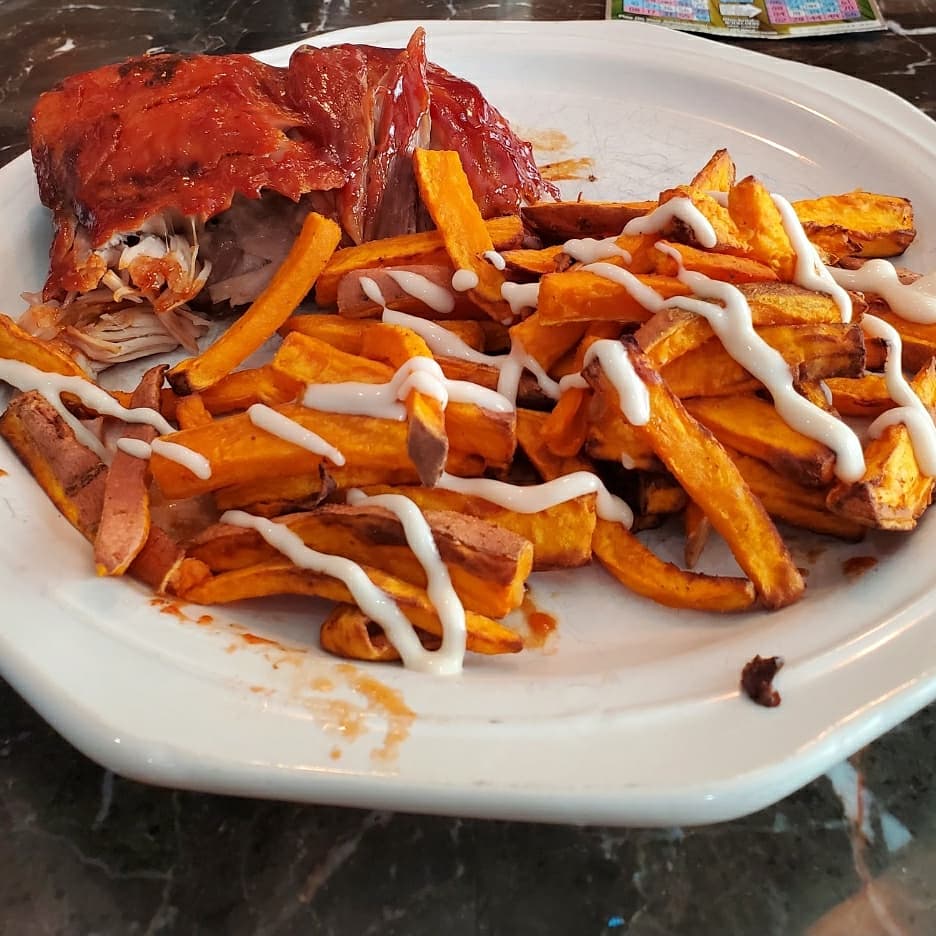 Baby back ribs and sweet potato fries with garlic aioli sauce. r/FoodPorn