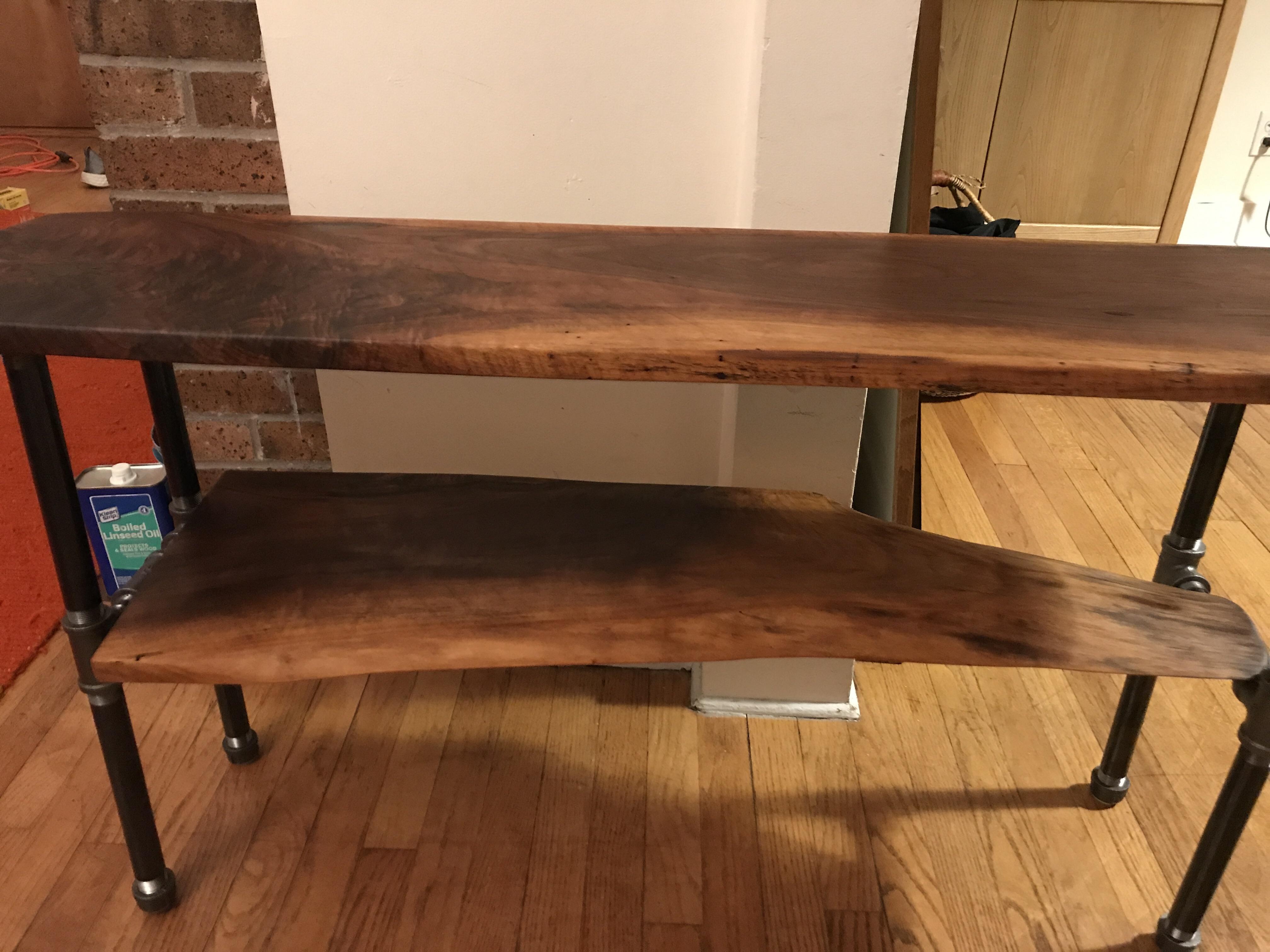 Just moved and needed a tv stand, walnut and black steel pipe finished with boiled linseed oil