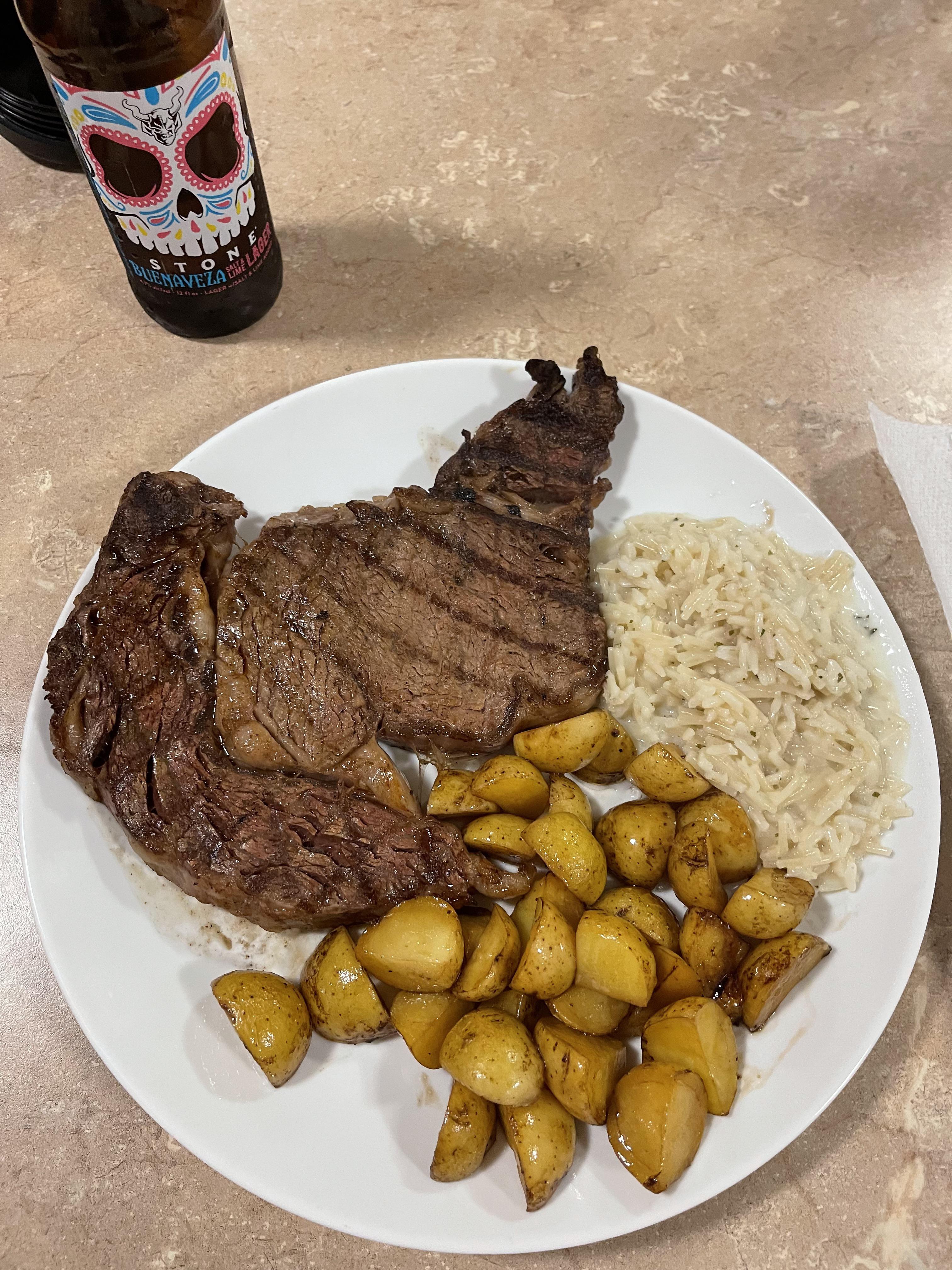 [Homemade] Delmonico Rib Eye with Roasted Potatoes and Garlic Parmesan