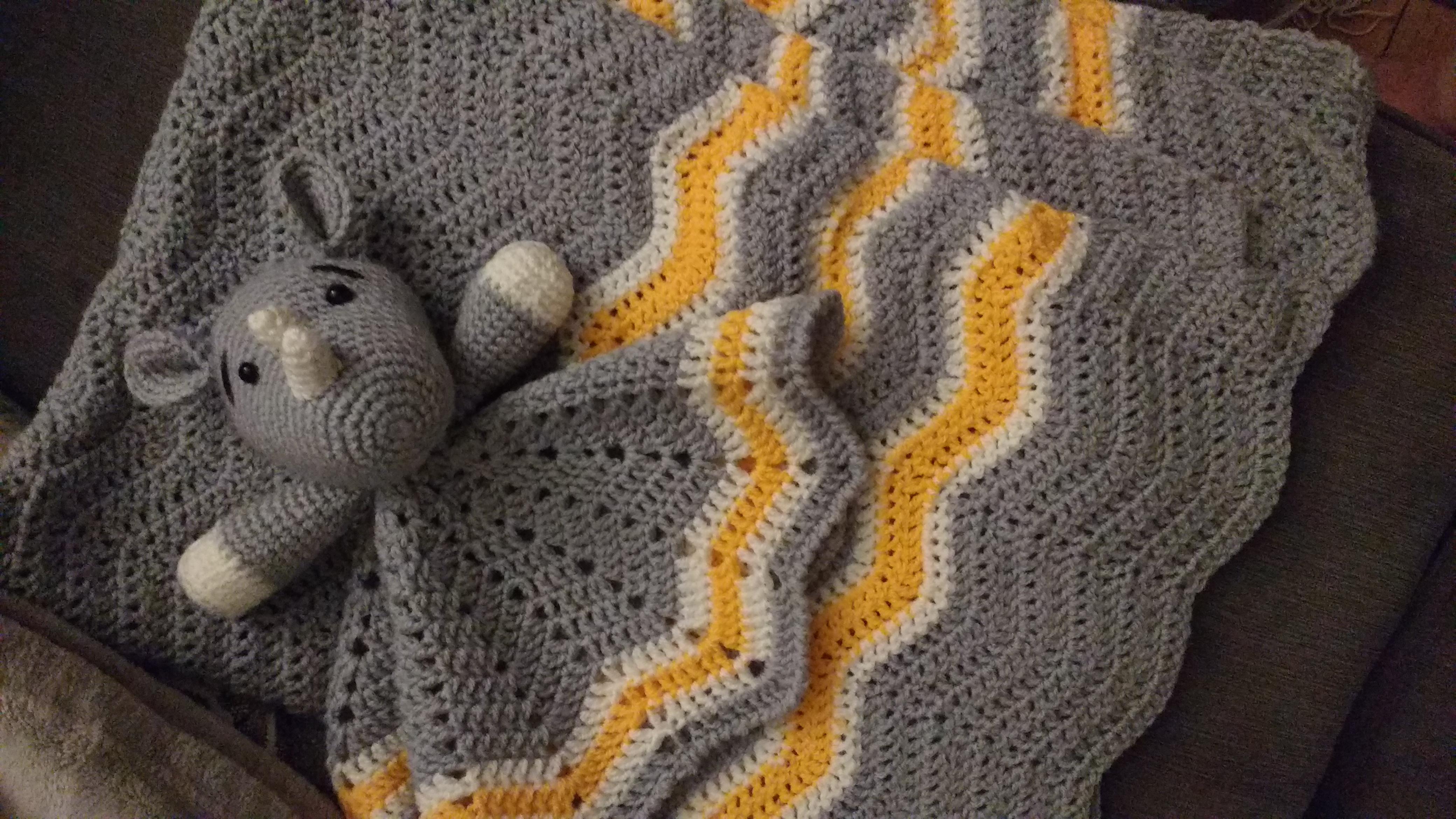 Baby blanket and rhino lovey that ive just finished for my boss r/crochet