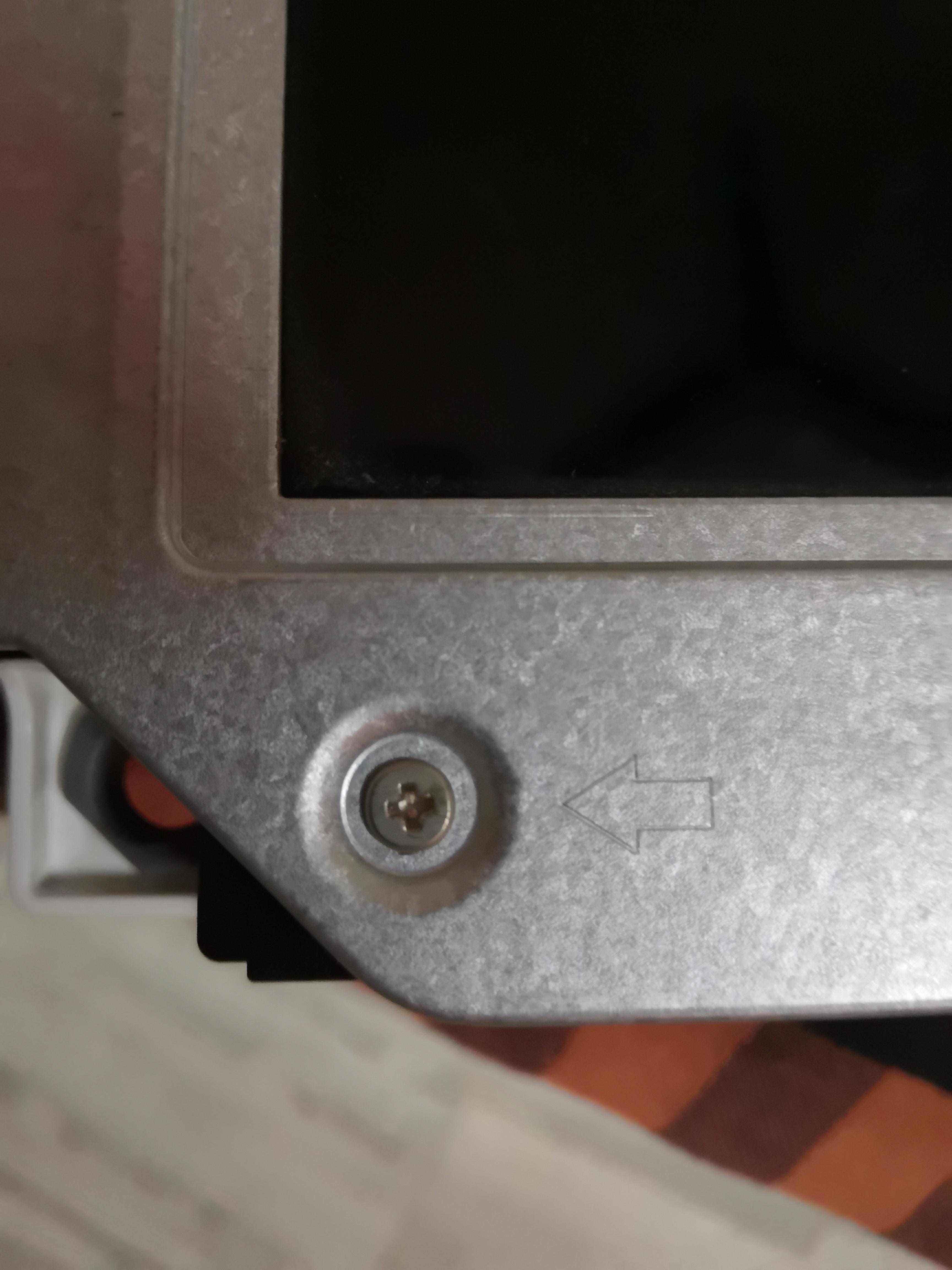 This is a screw on the inner plate of my LCD TV (Sony Bravia 32). I can