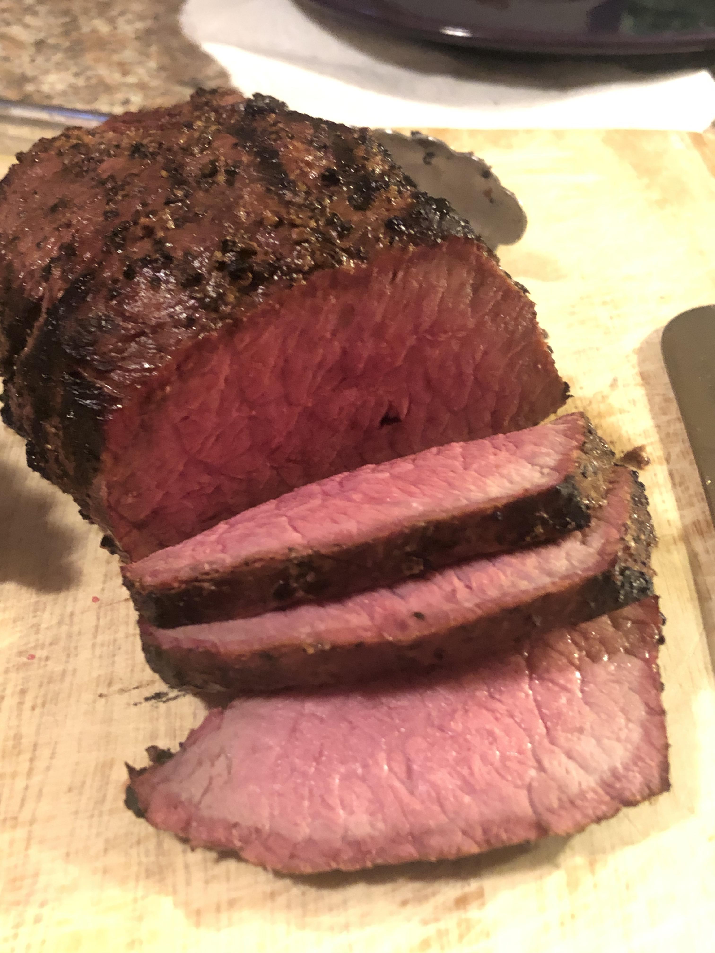 Beef roast, smoked to 125 over hickory on er kettle, seared and rested. Season with salt