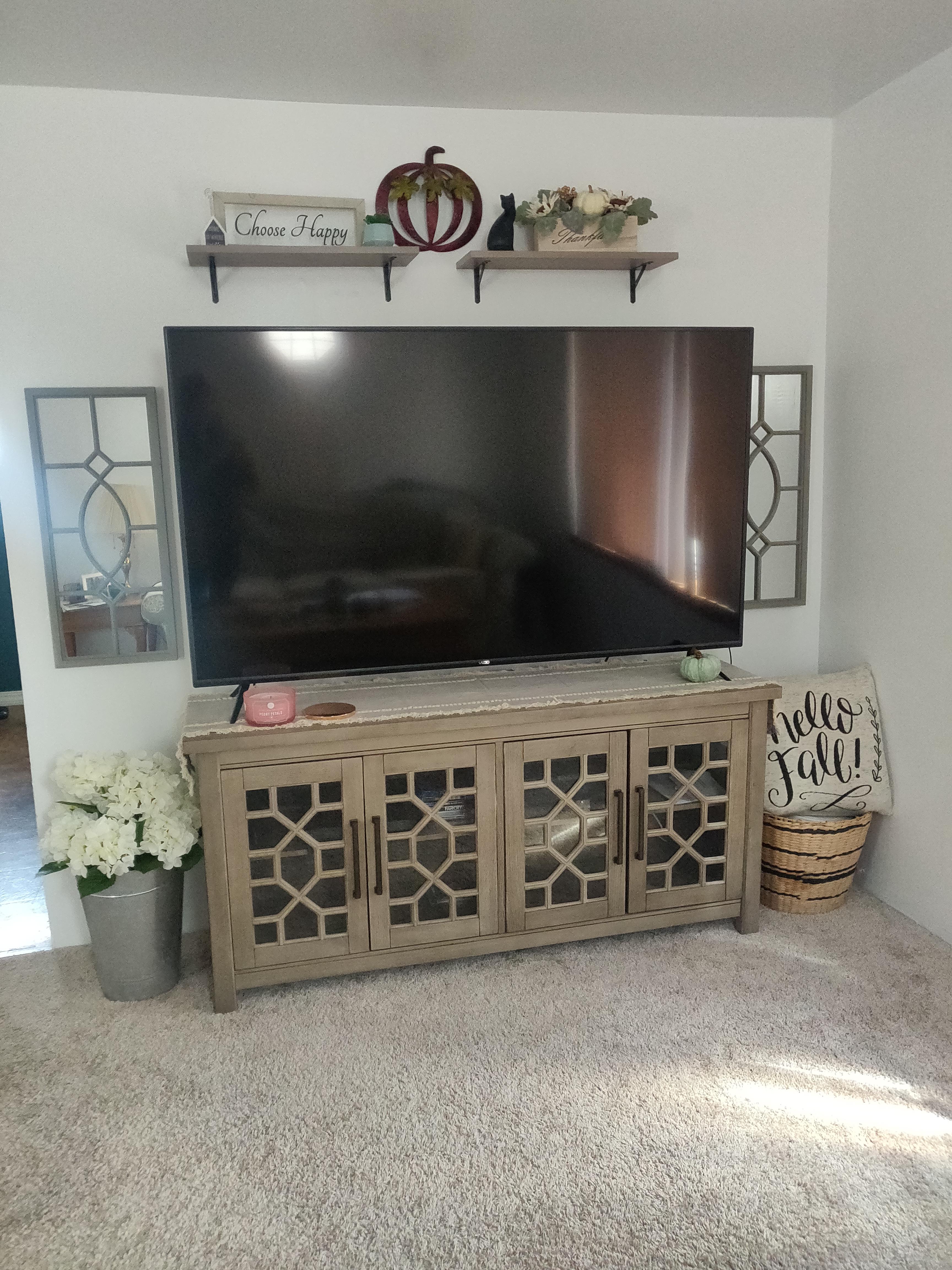 I love my tv stand however I'm having a difficult time figuring out