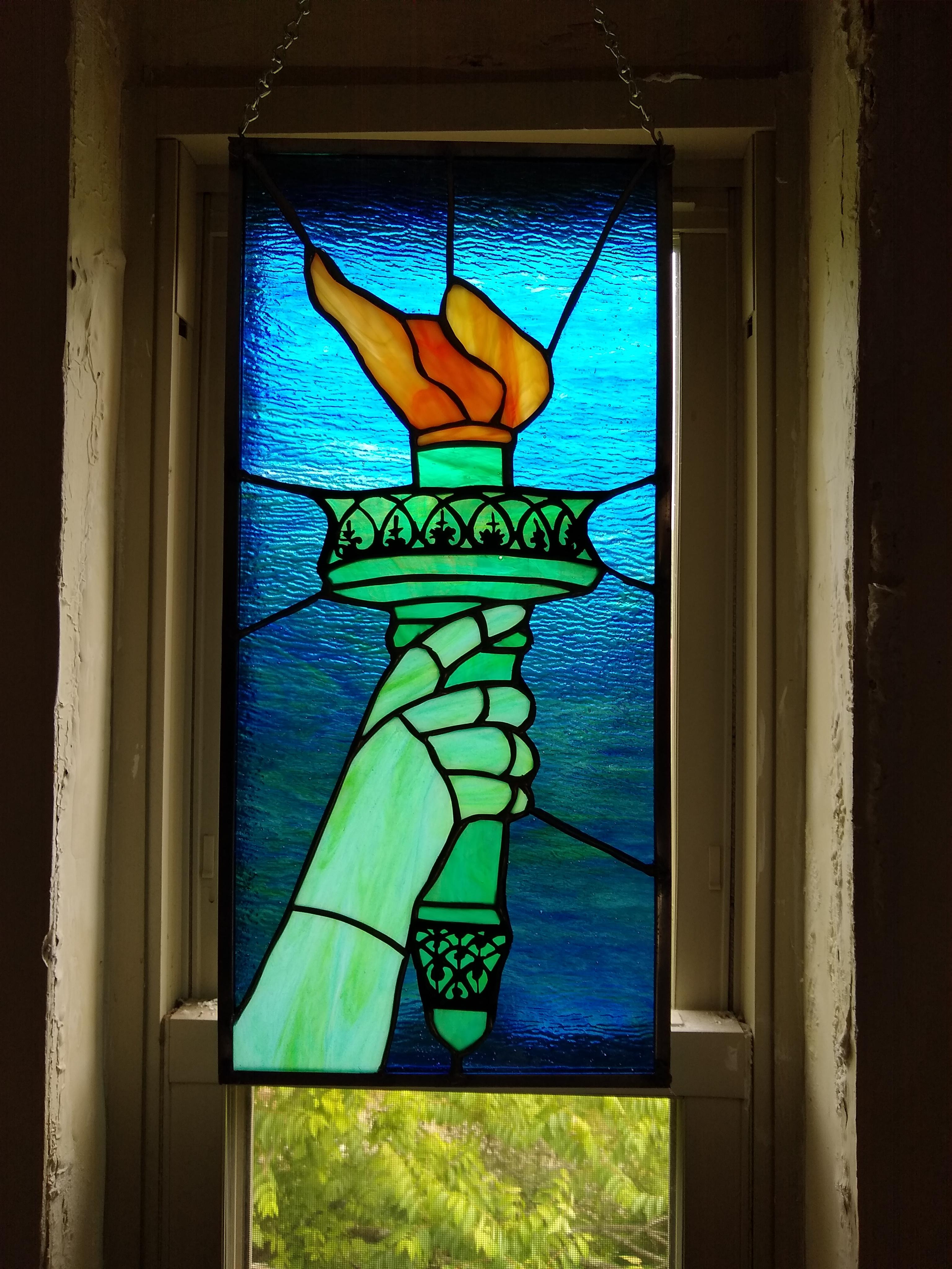 Stained glass piece I made going to a fundraising auction today. r