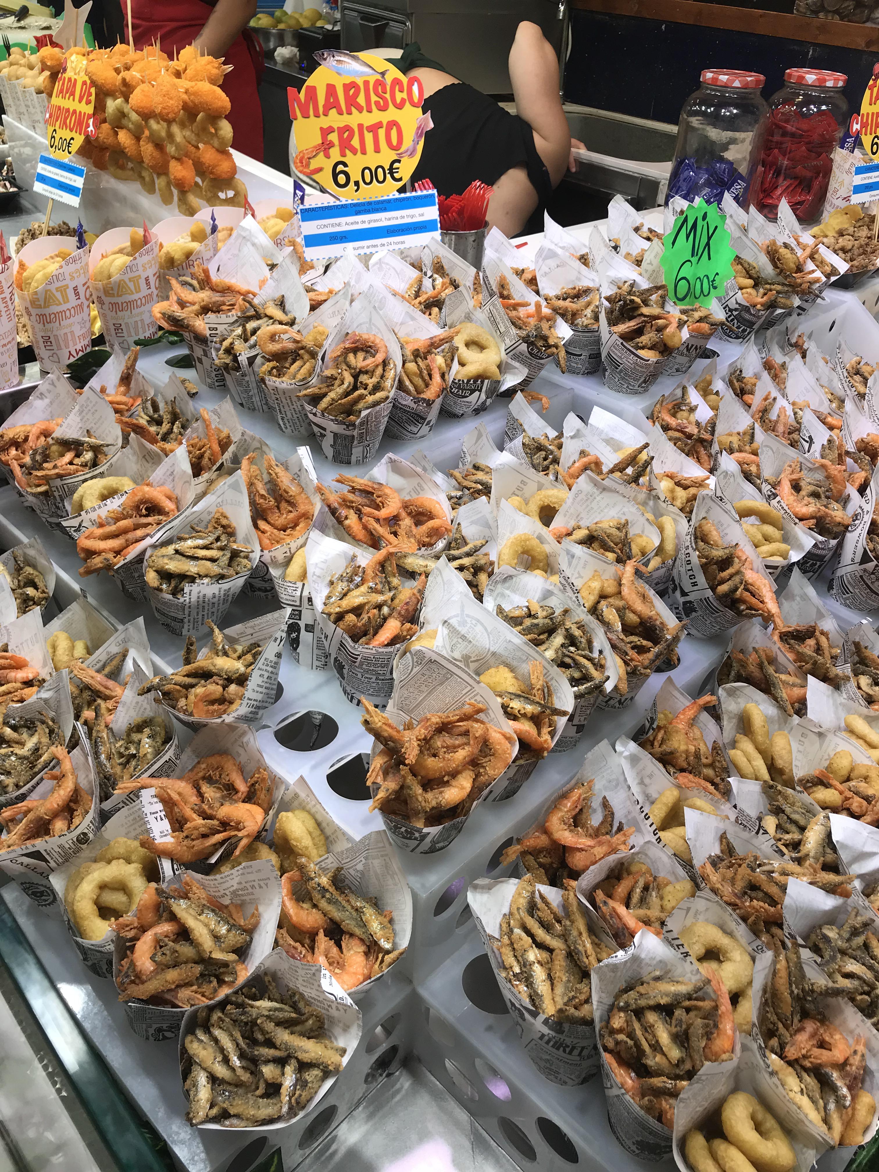 Cones of fried seafood in a steeet market in Spain ; anchovies