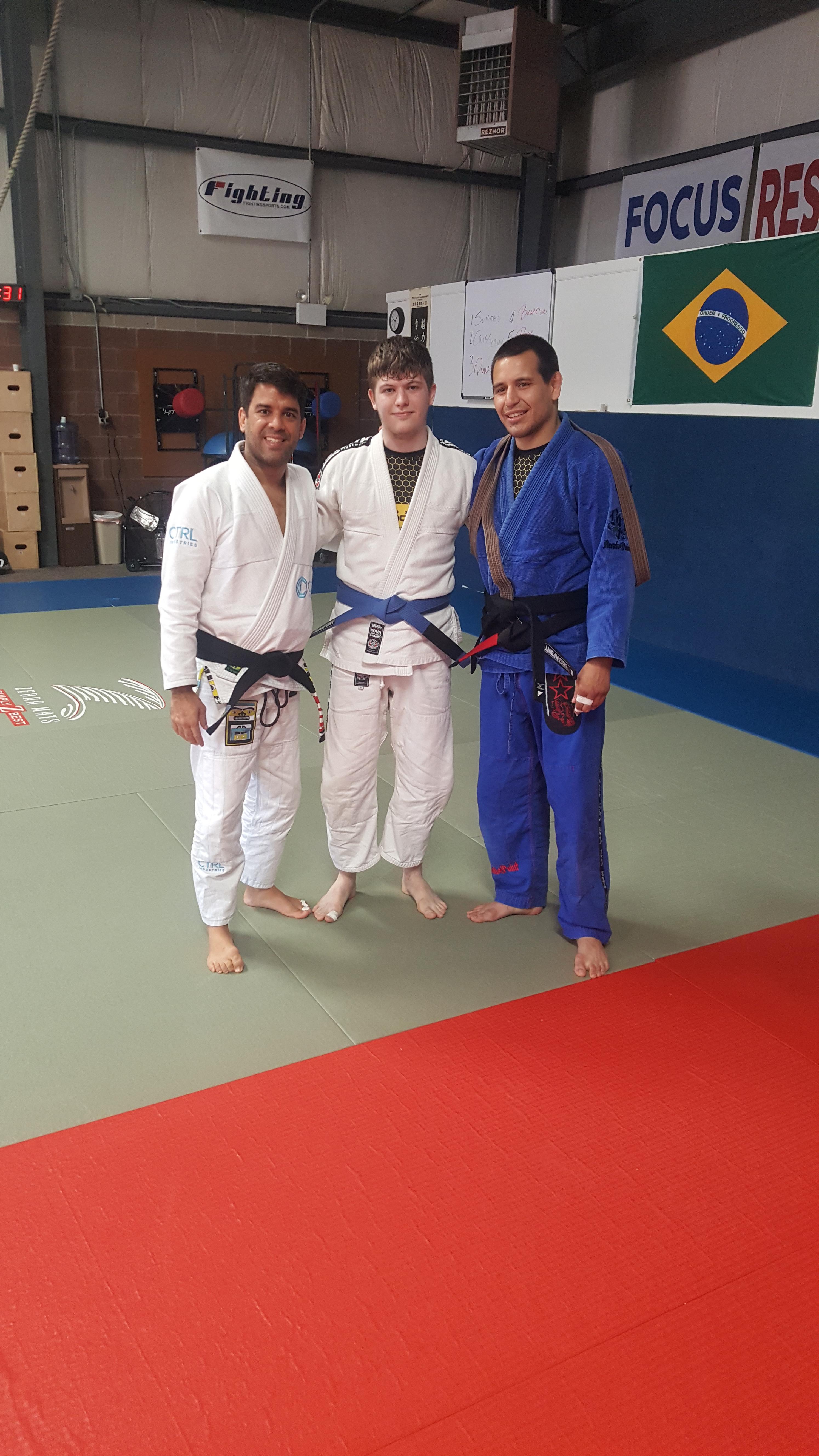 Got my blue belt the same day my instructor got his black belts in bjj