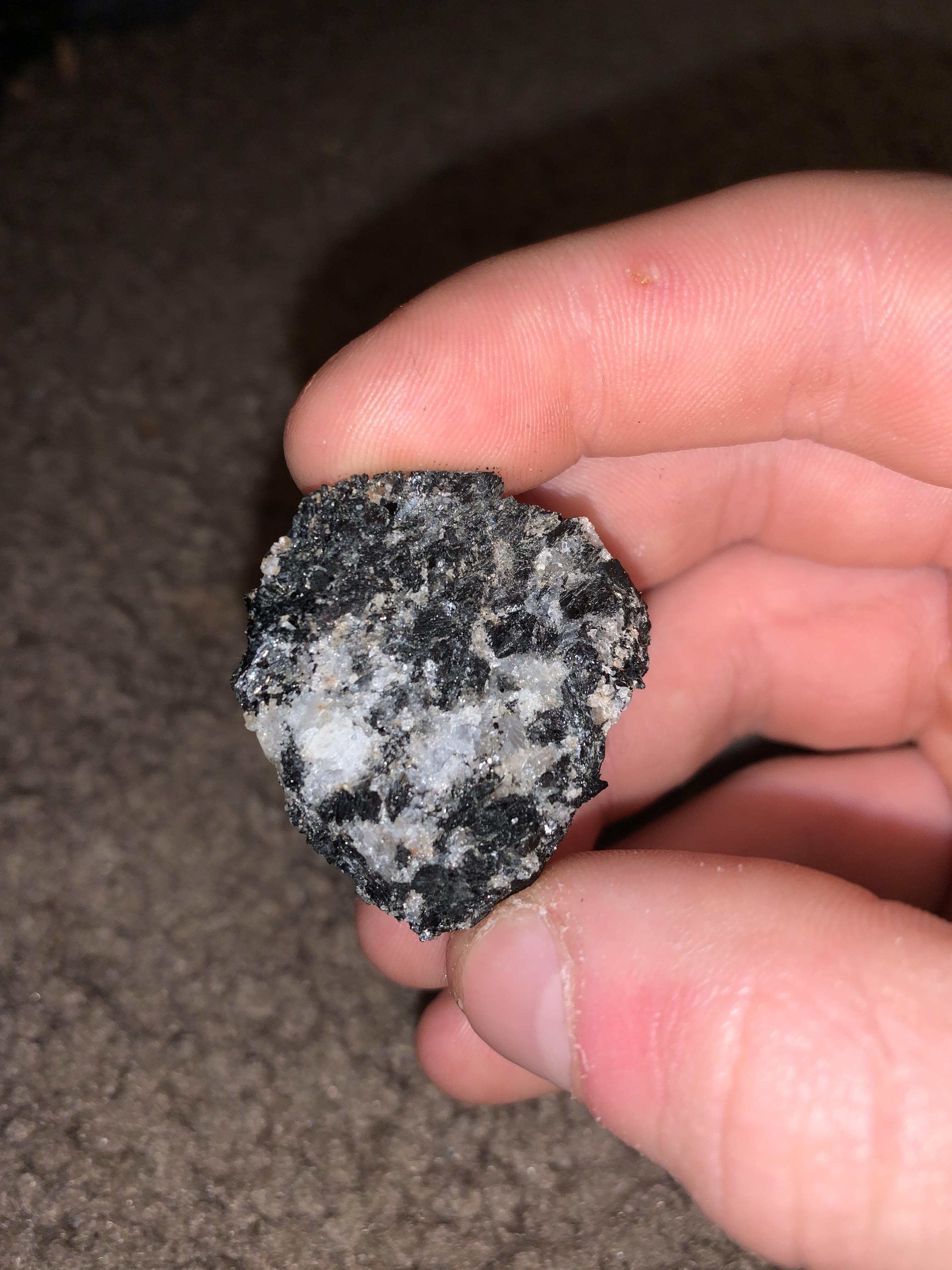 What is this rock is has what I think is quartz on it I have no idea