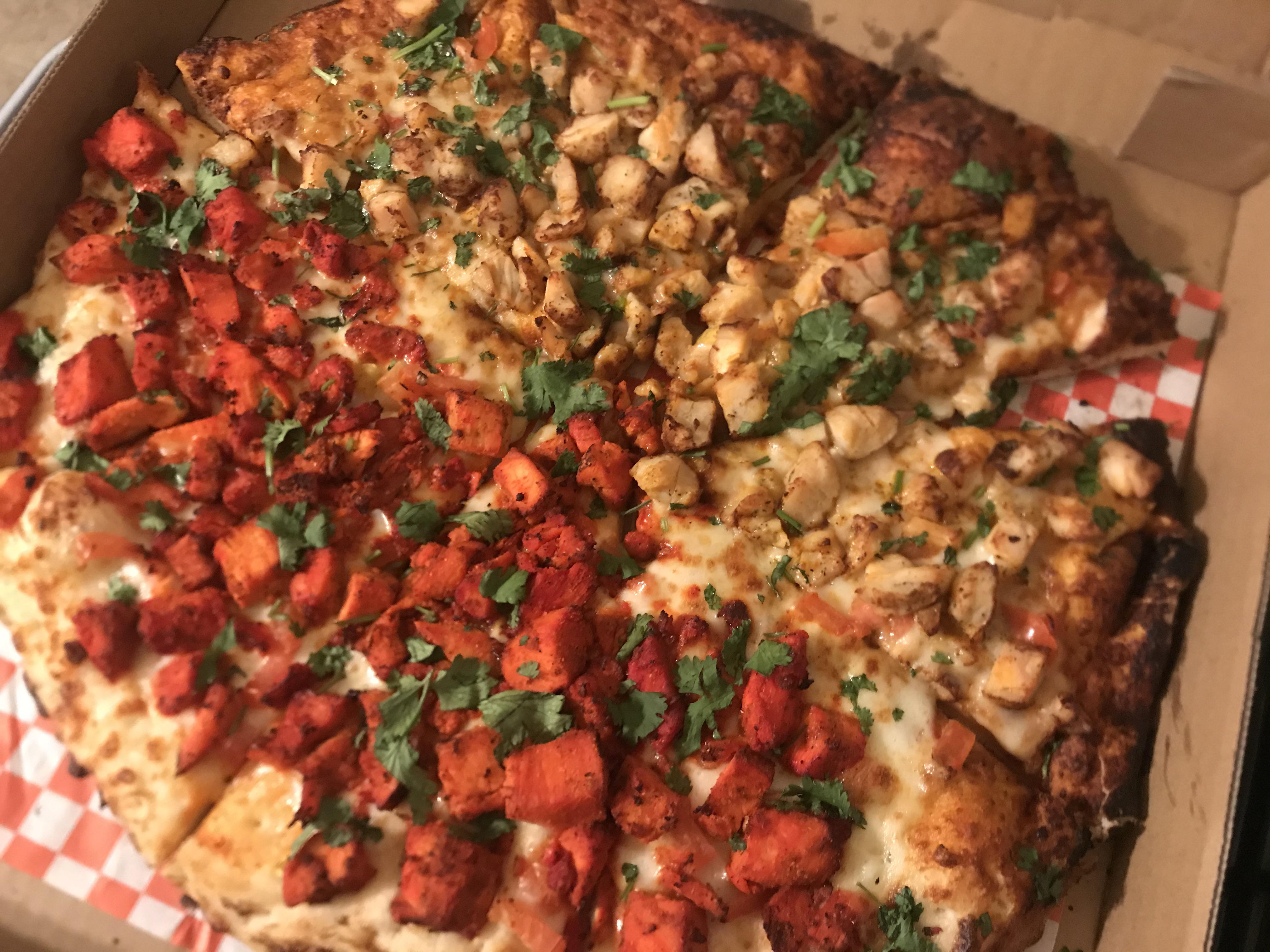 Butter chicken pizza and tandoori chicken pizza from The Curry Pizza