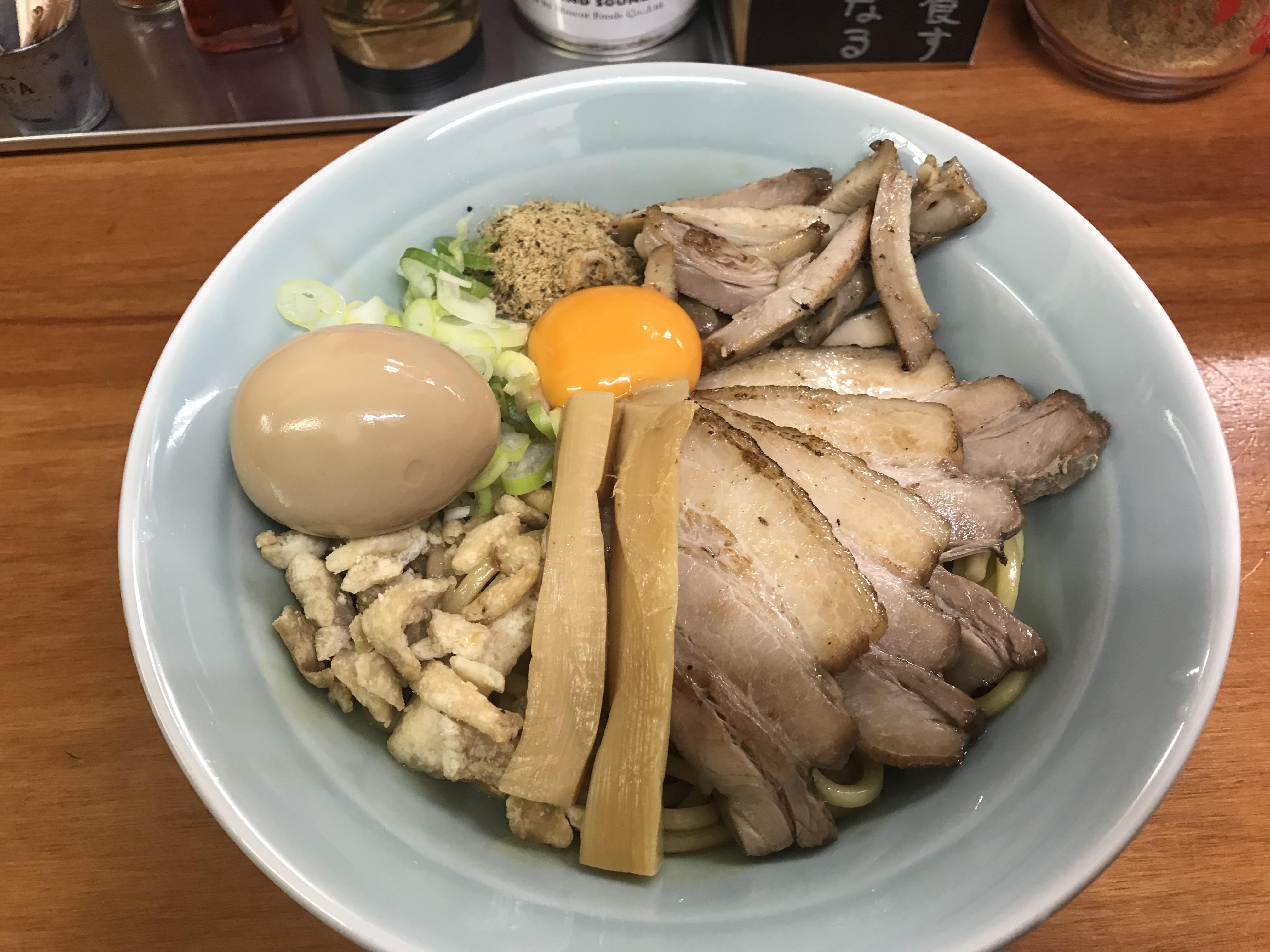 Soupless Ramen. With chashu pork and a tasty egg. Bakuten in Tokyo, Japan. r/ramen