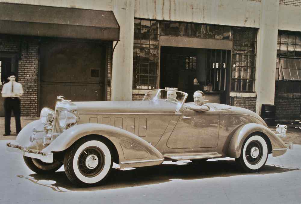 Barney Oldfield behind the wheel of a custom 1933 Chrysler Imperial r