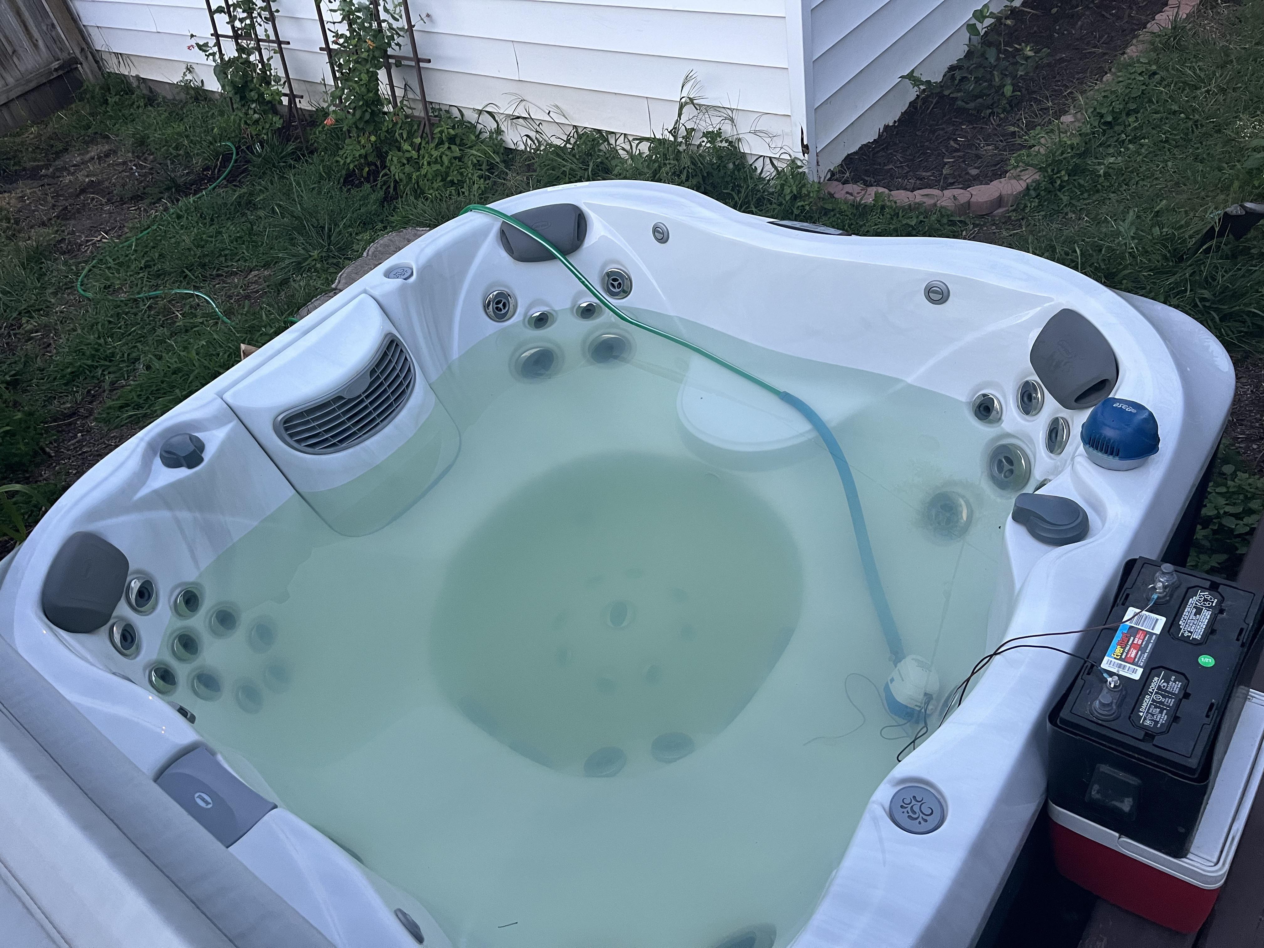 Used the bilge pump from my boat to drain my hot tub. Adapt and