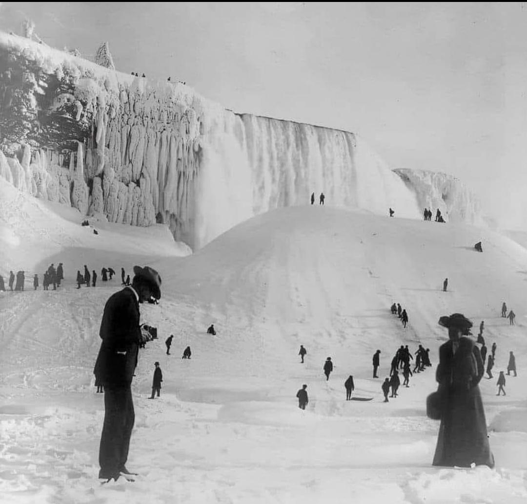 People having fun on a Frozen Niagara Falls during the winter months in