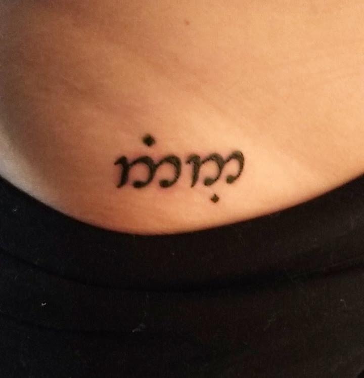 9 in Elvish (Tengwar) for the Fellowship, same location