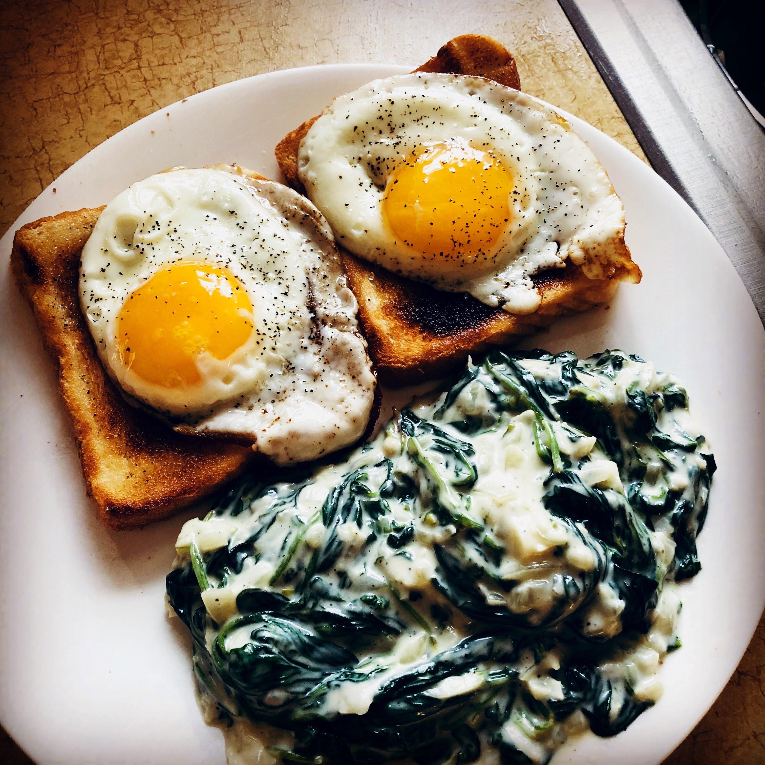 [homemade] fried eggs and creamed spinach food