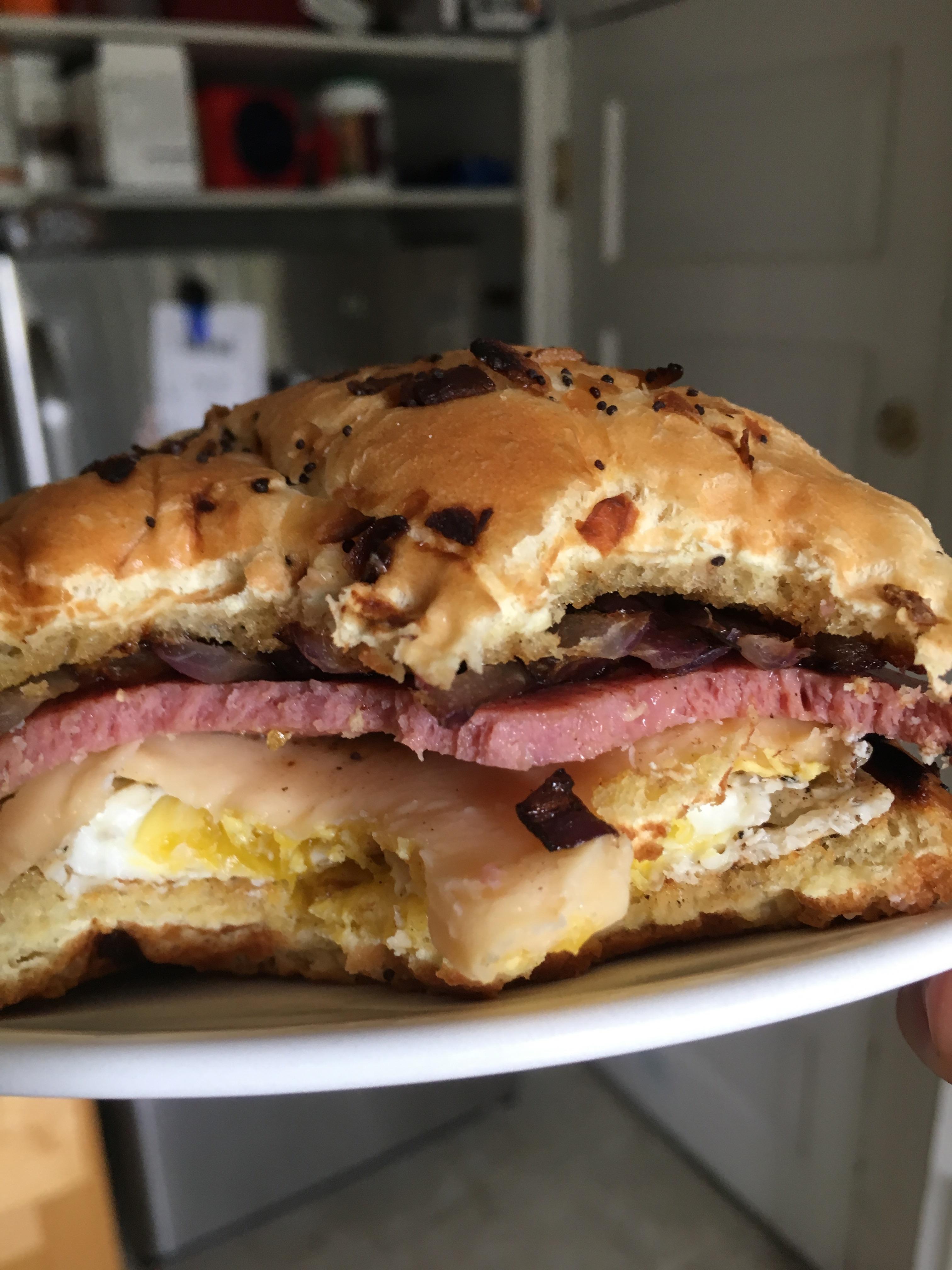 Breakfast. Fried bologna, egg, onions, and gouda. All wrapped up in an