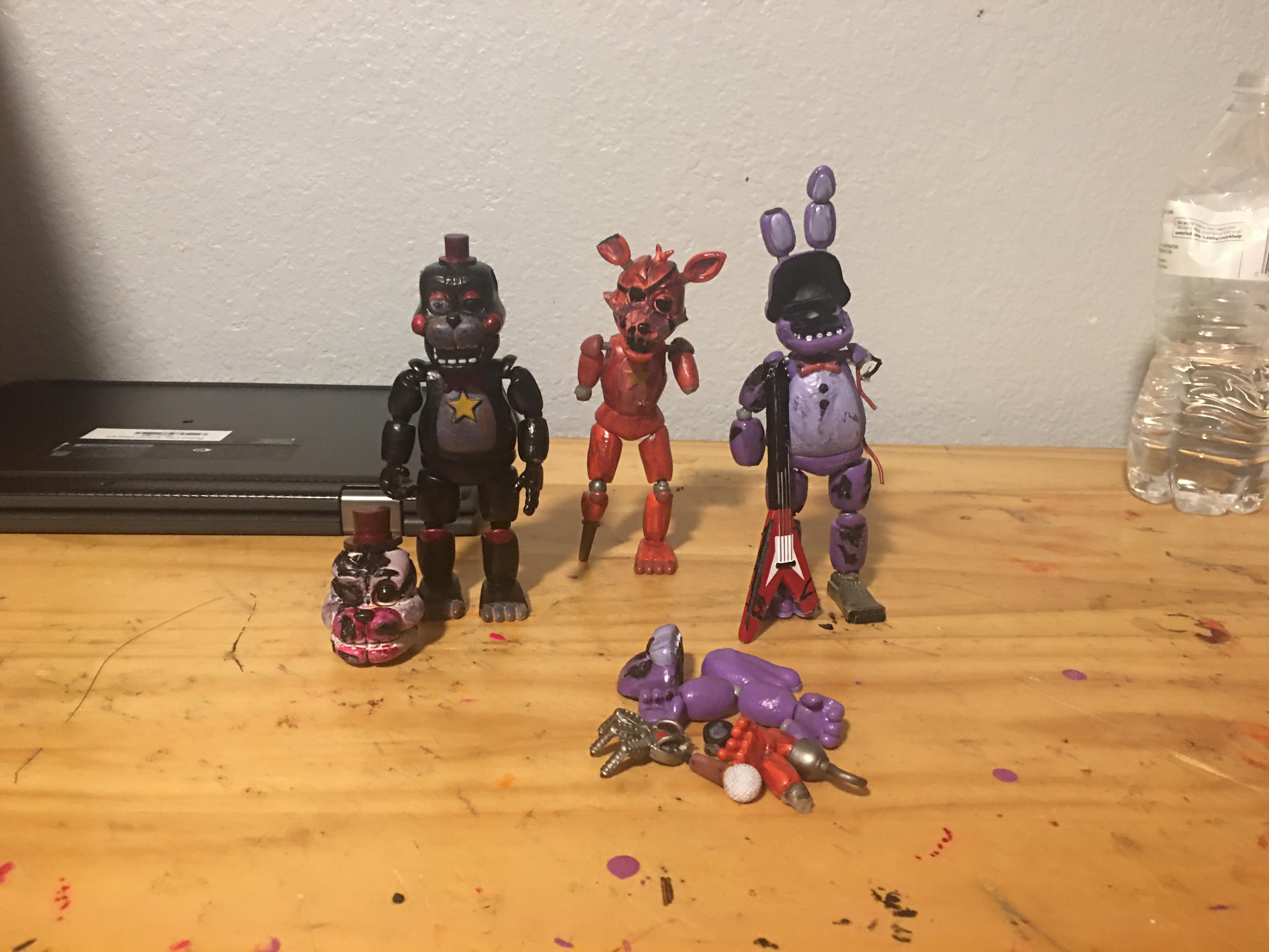 My customs fnaf action figures im still not done with them i made whithered bonnie, repainted