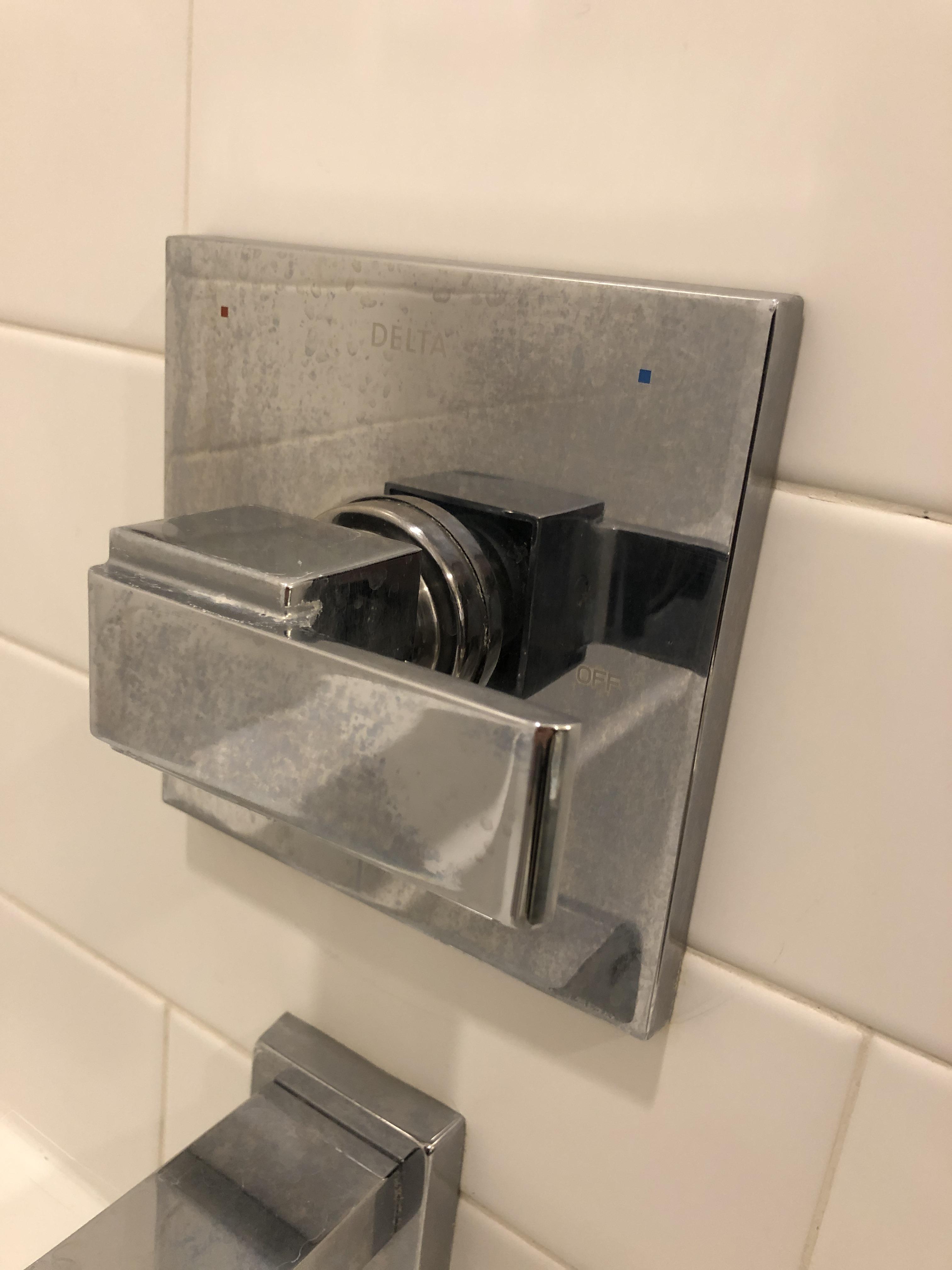 Any clue how to clean these hard water spots off of steel in shower