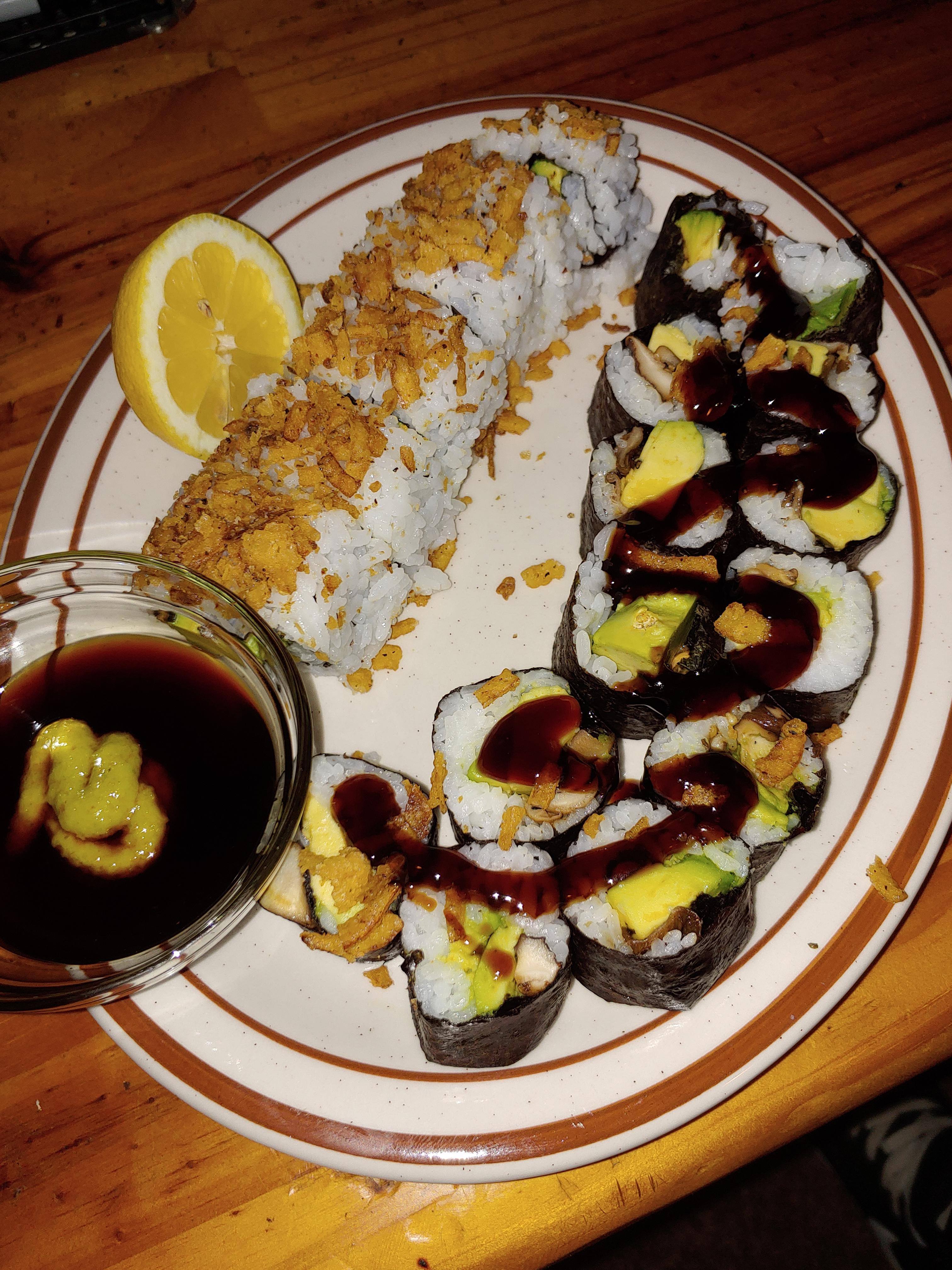 Shiitake mushroom and avocado rolls with crunchy onion and eel sauce