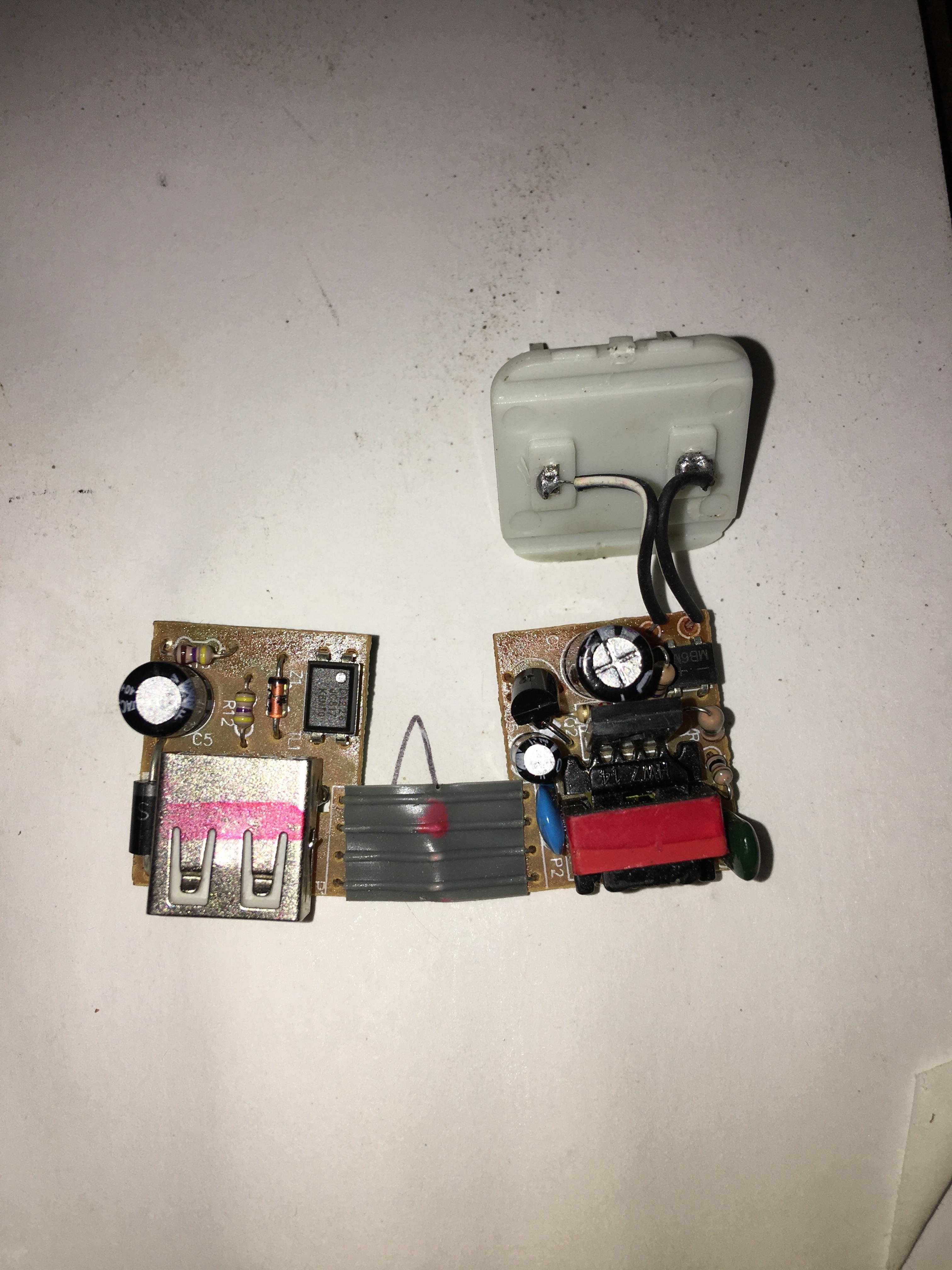 Help identifying components in a wall charger. I took apart a charging