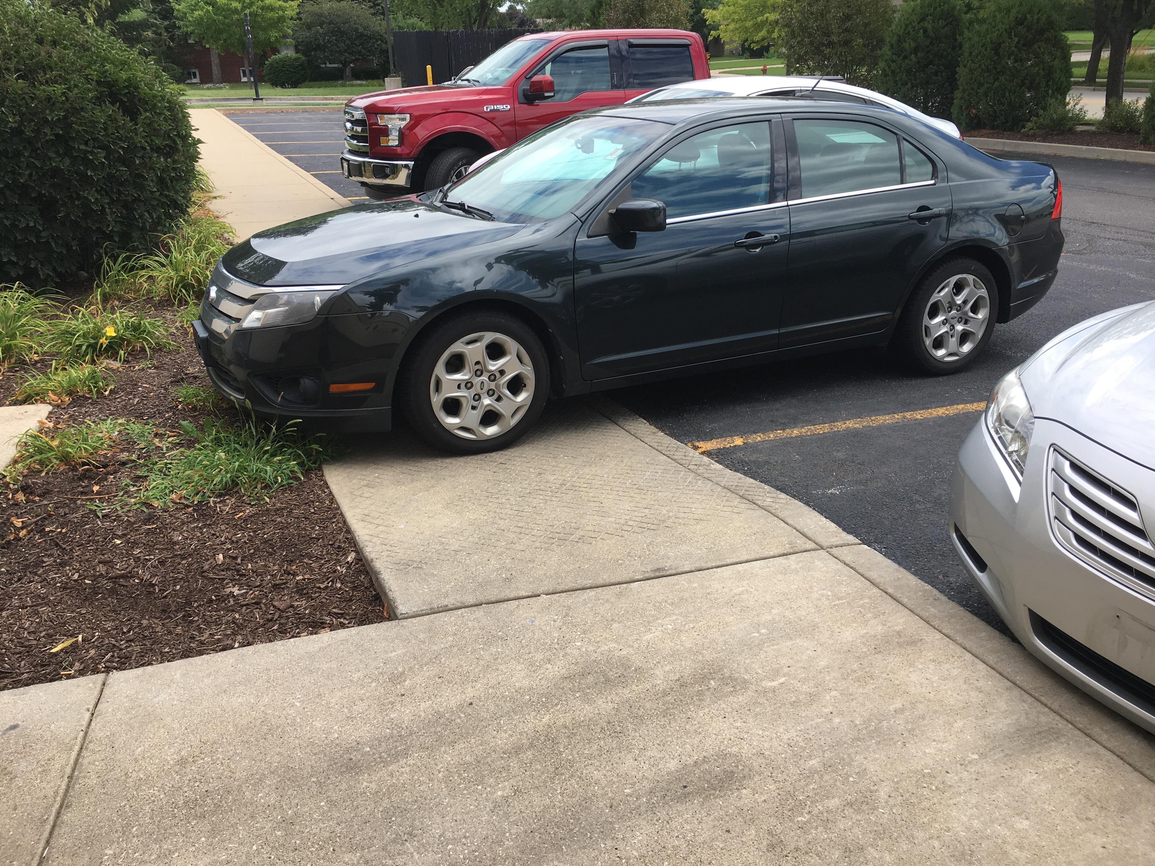 I should have done a Bo Duke hood slide across this thing. r/badparking