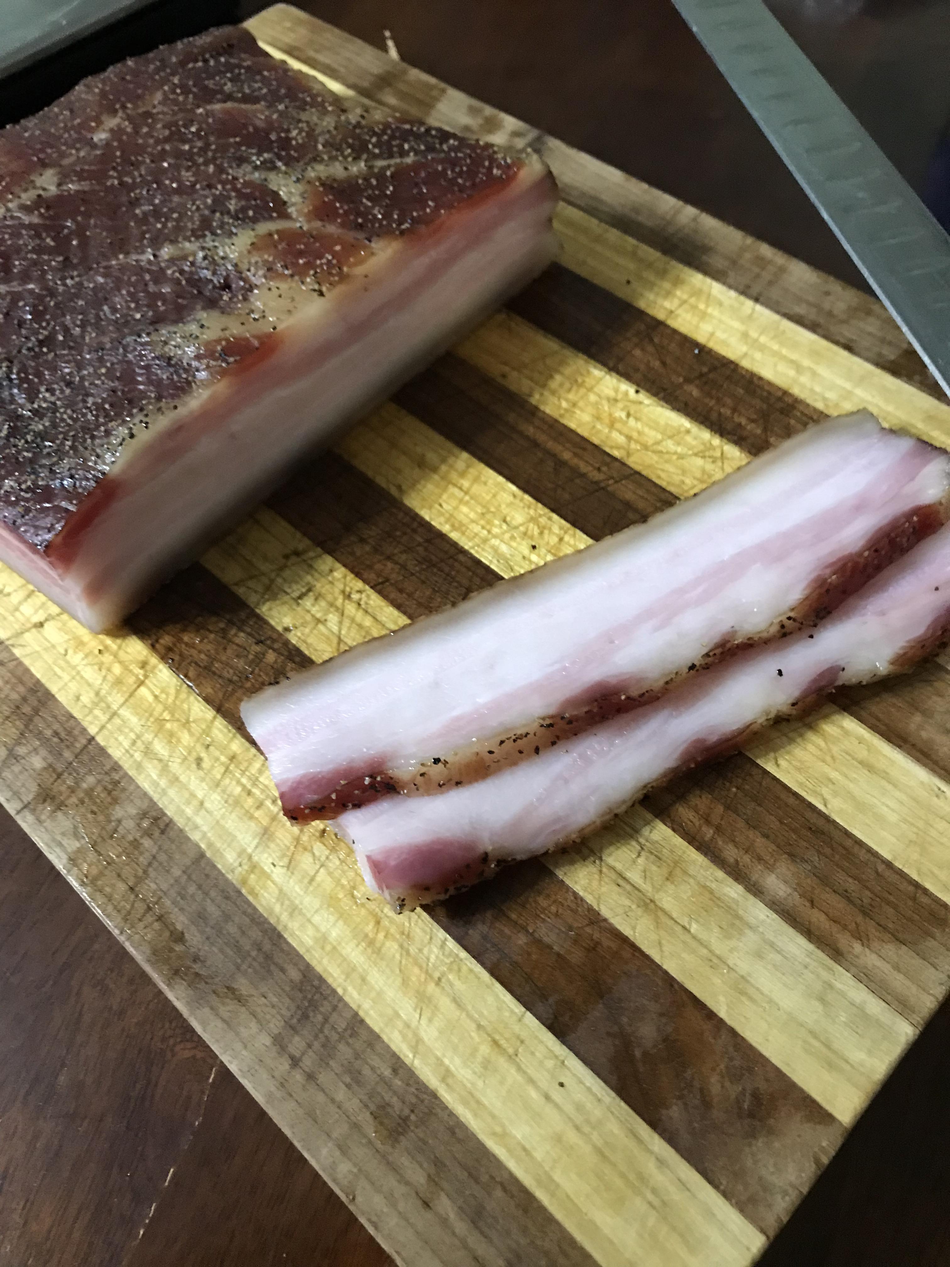 8 day cure, 1 hour soak, 2.5 hour smoke and you will never buy bacon in