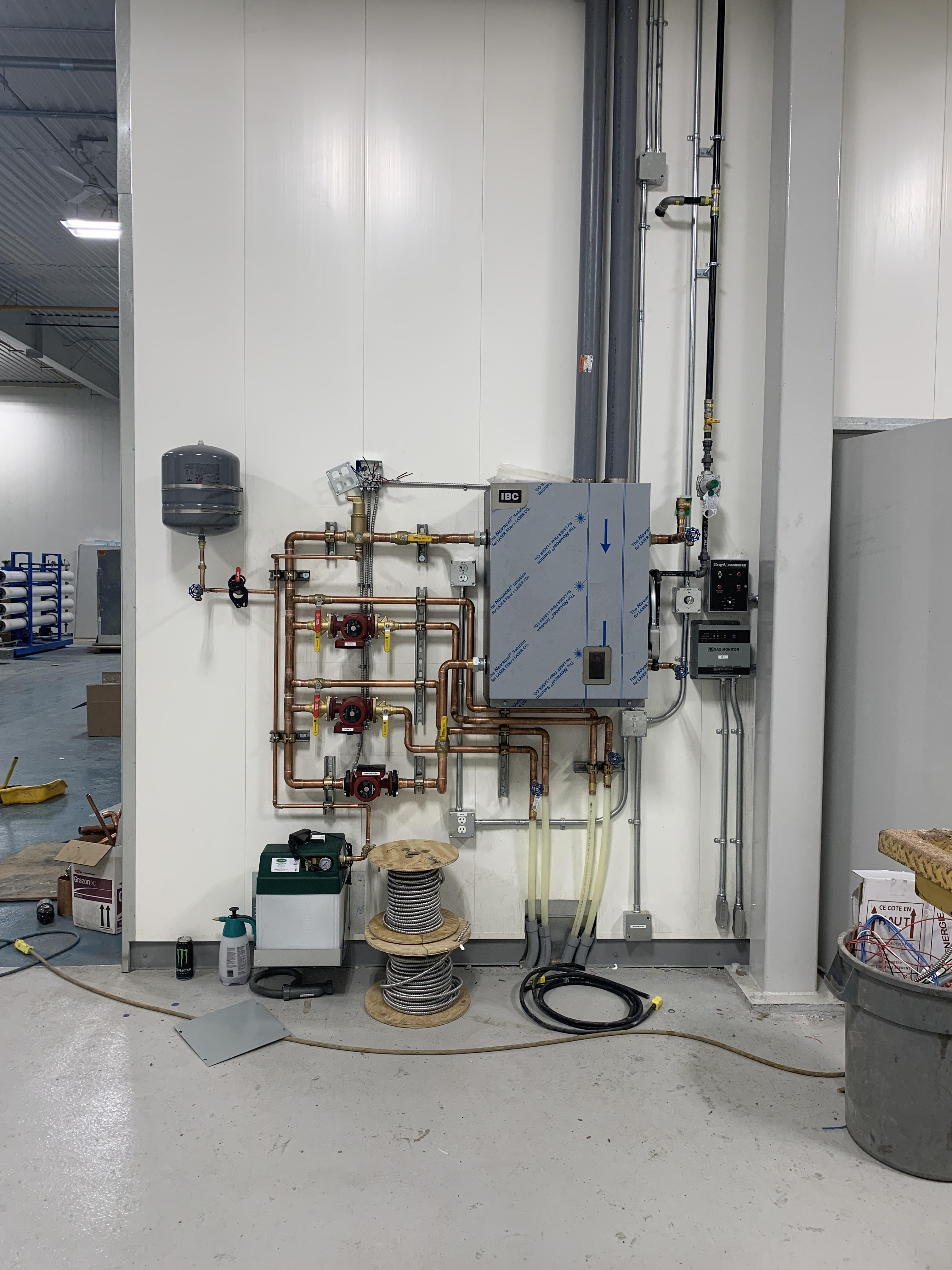 Boiler for Infoor in wash bay, and remote snowmelt panels. Had to pump