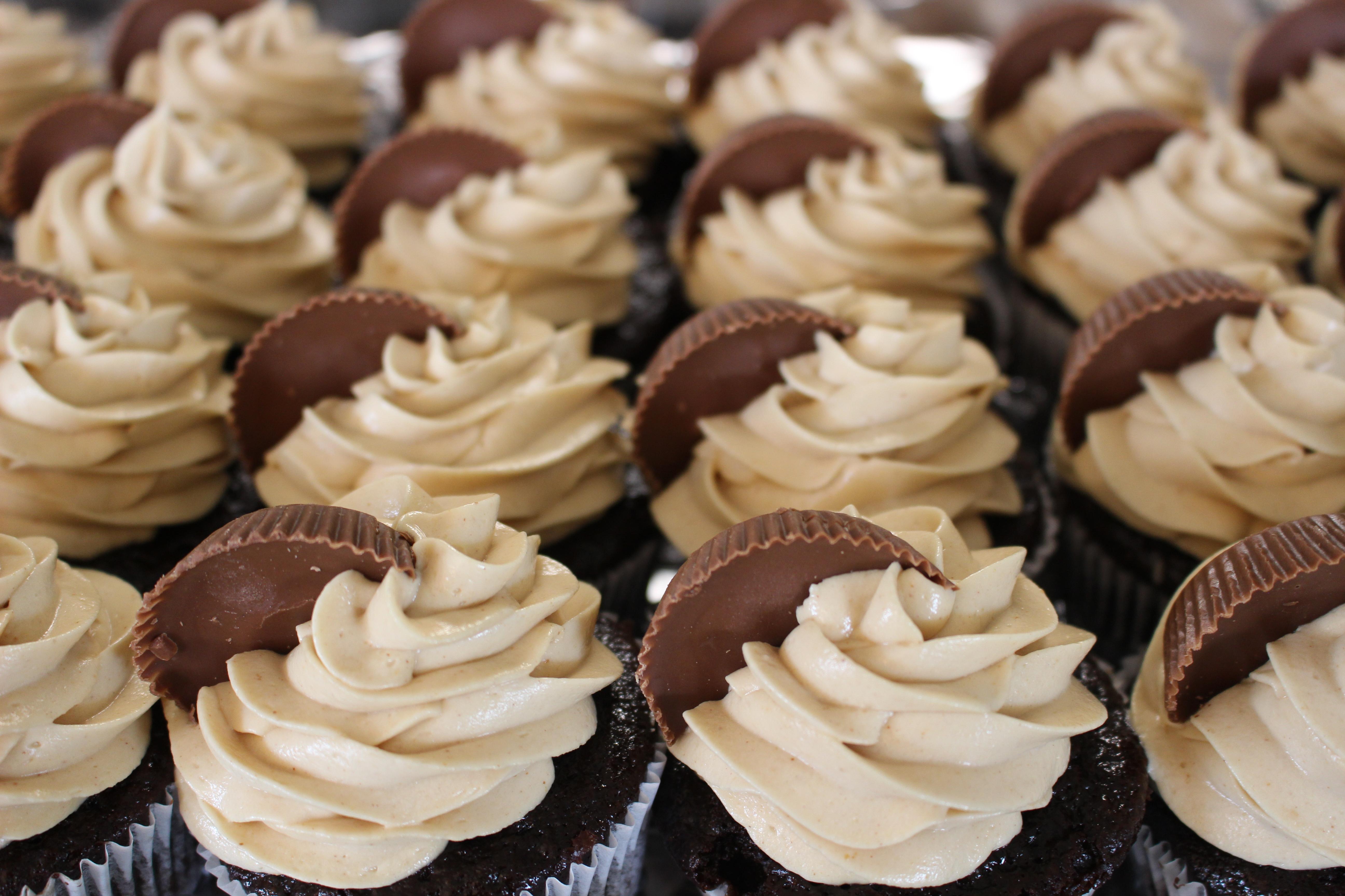 Reese's Peanut Butter Cup Cupcakes with a surprise peanut butter cup
