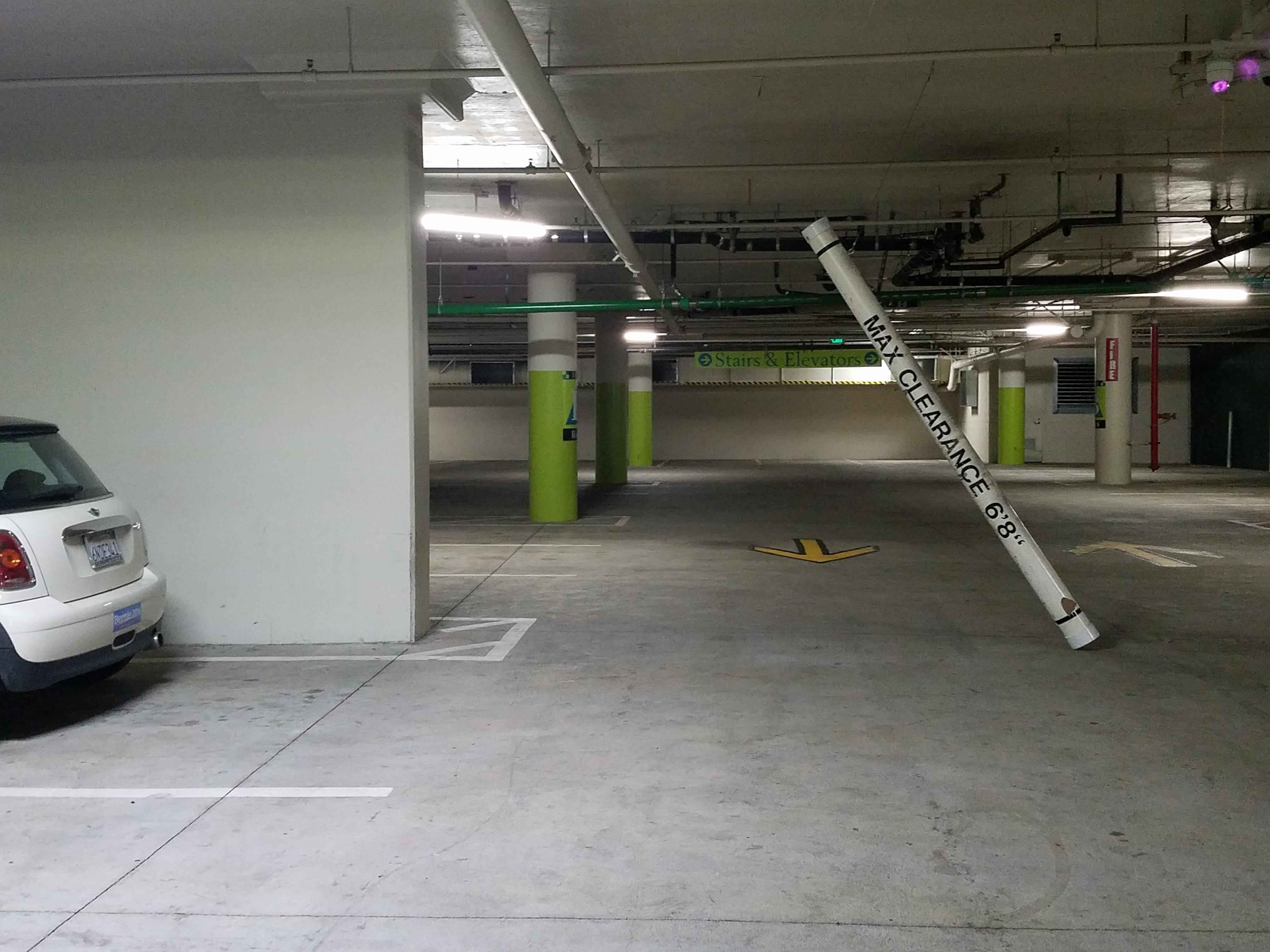 The clearance bar in the parking garage fell down r/mildlyinteresting