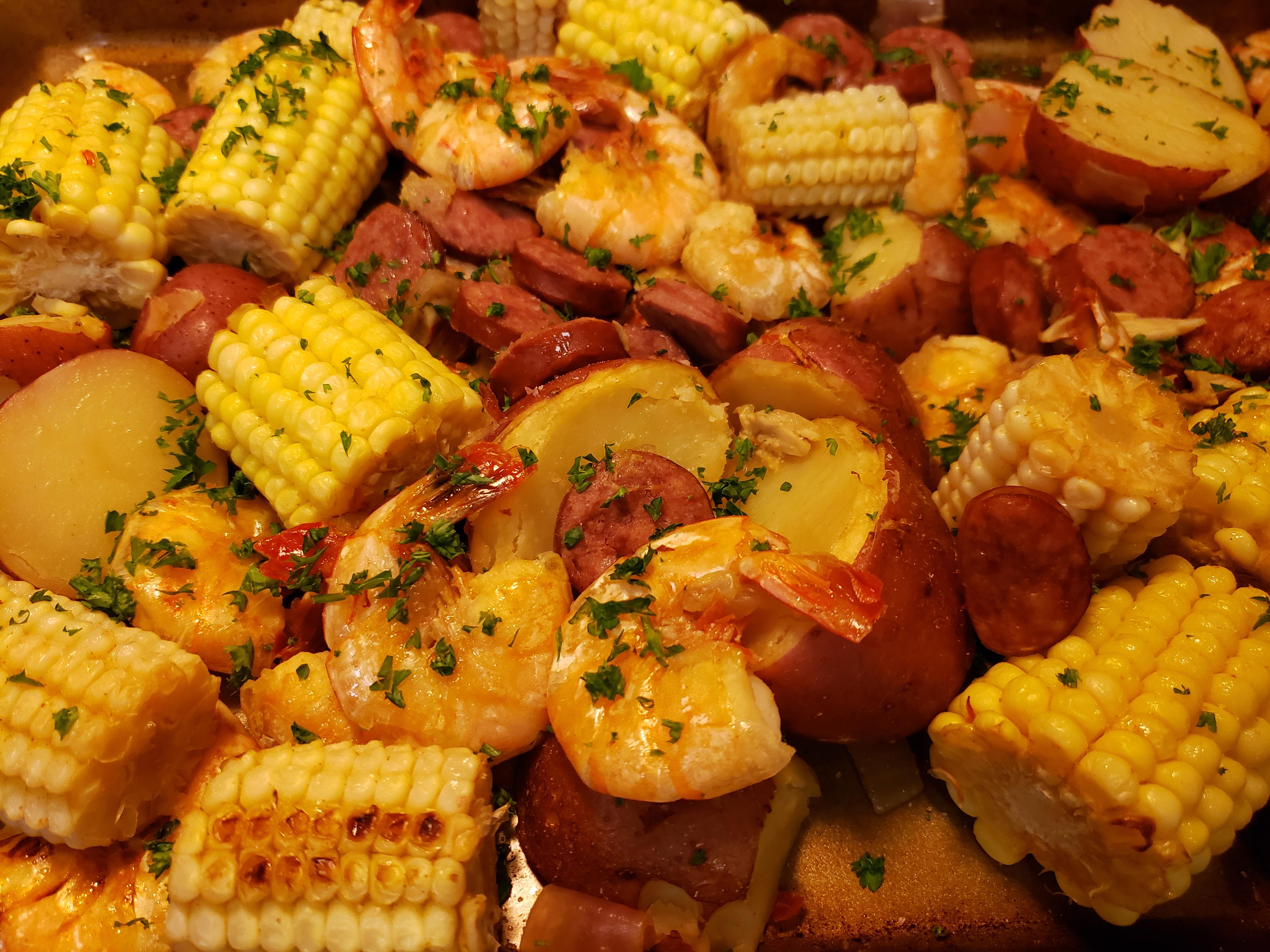 Shrimp boil, spicy andouille sausage, and lots of Old Bay r/FoodPorn