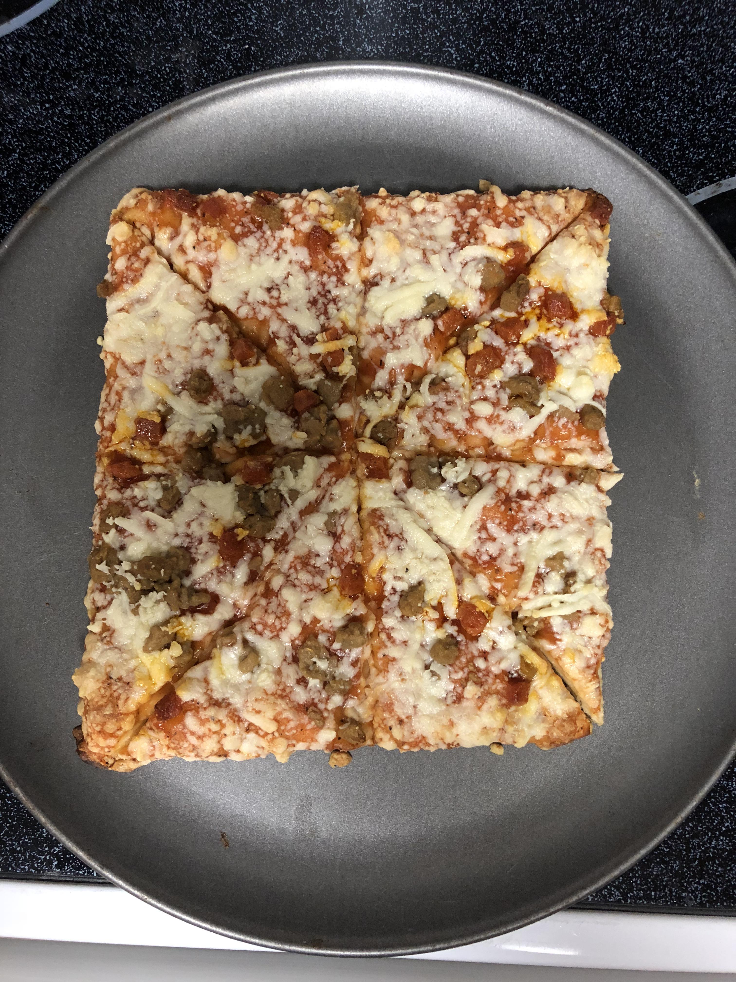 What about a square pizza, cut into triangles, on a round pan? r/funny